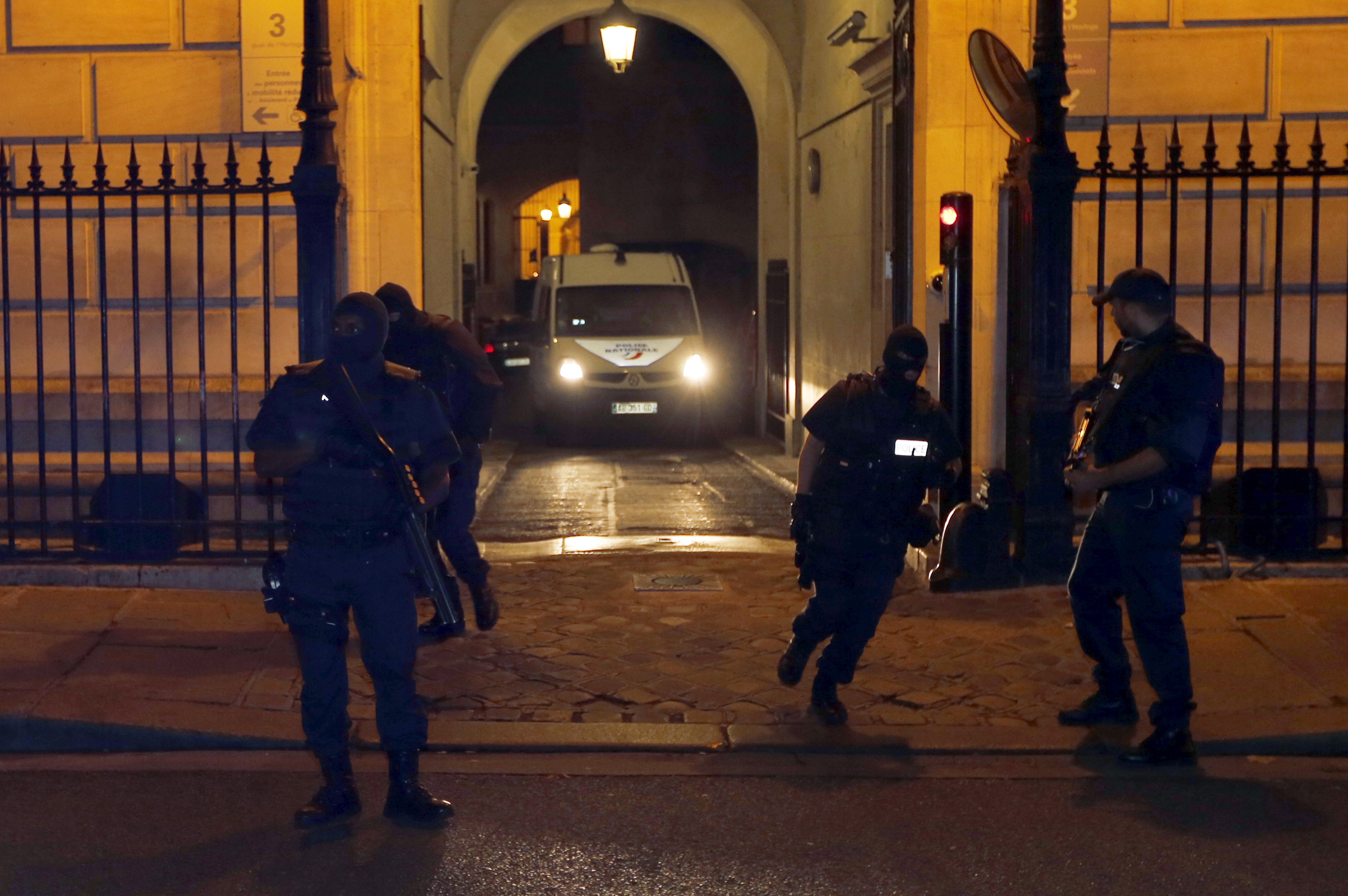 A police van believed to be transporting Moroccan Khazzani leaves the courthouse in Paris