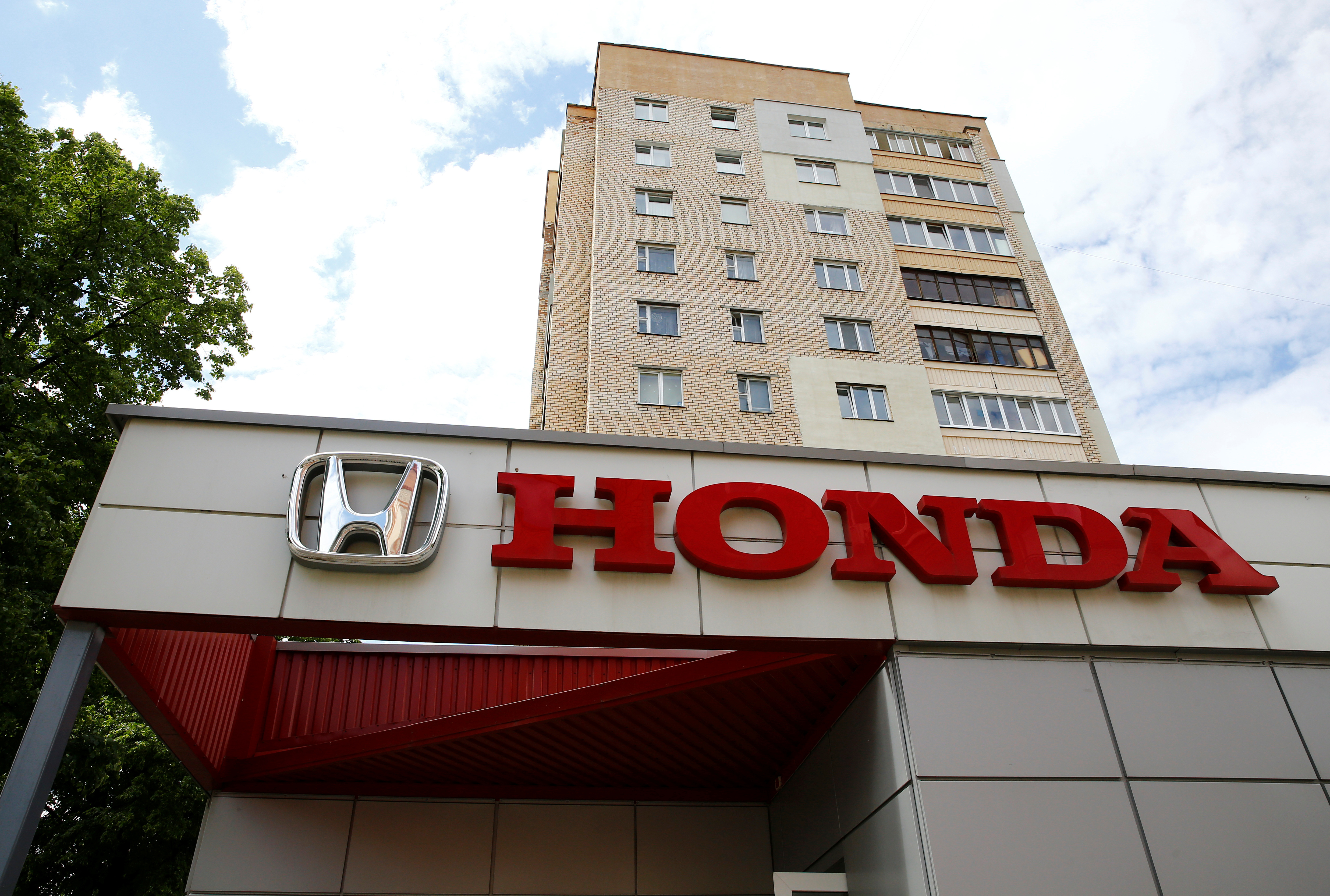 Honda car company logo is seen on a building in Minsk