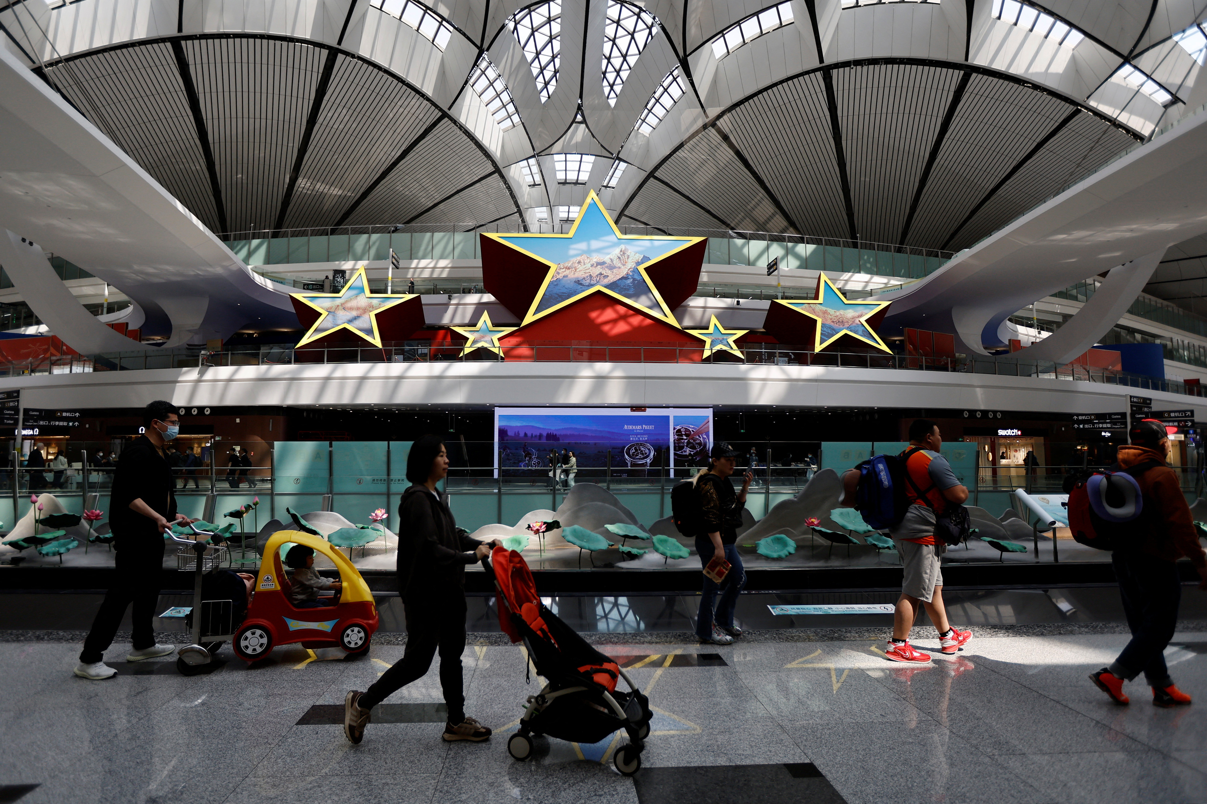 Travellers at Beijing Daxing International Airport