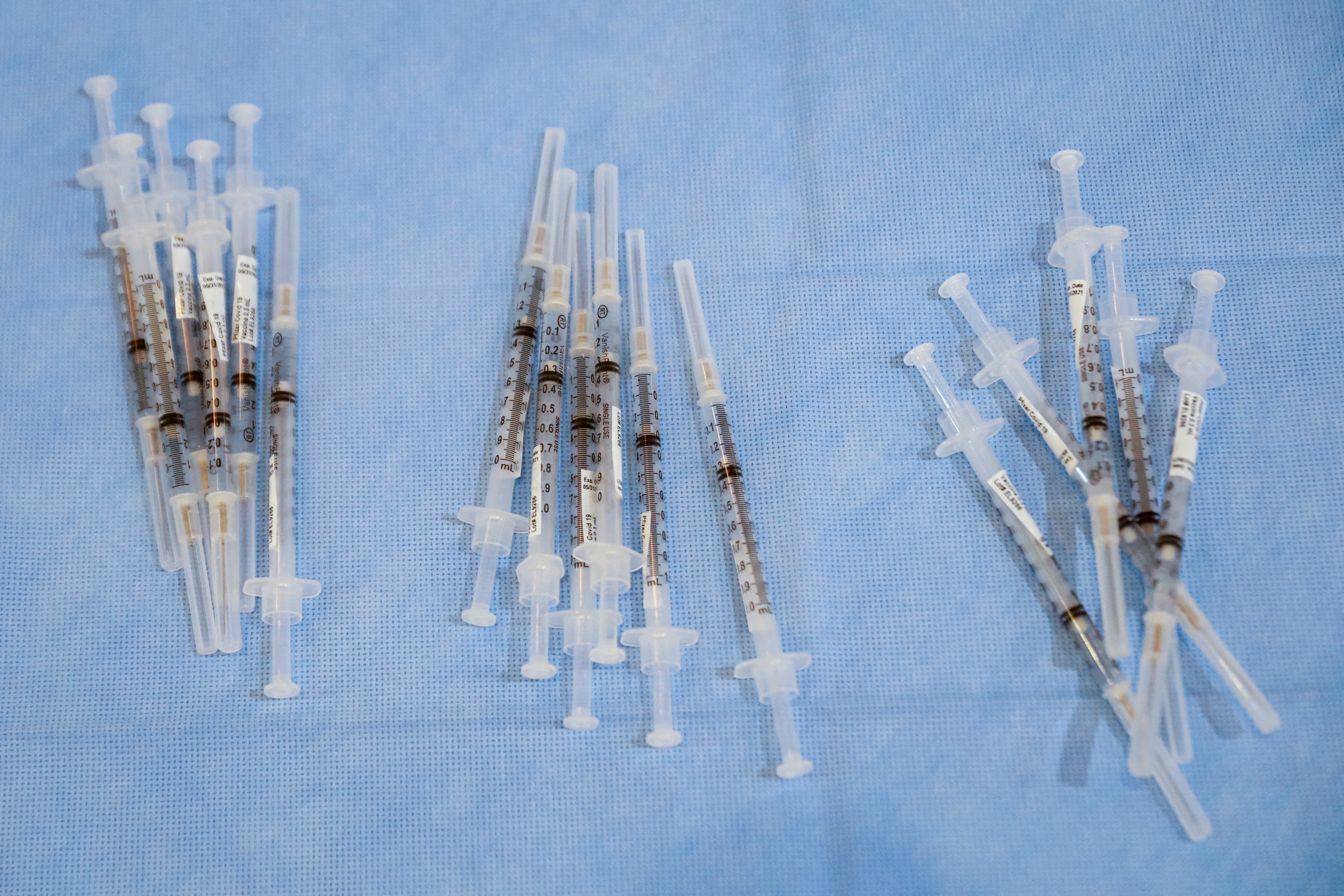 Syringes filled with a doses of Pfizer's coronavirus disease (COVID-19) vaccine are seen at a pop-up community vaccination center at the Gateway World Christian Center in Valley Stream, New York