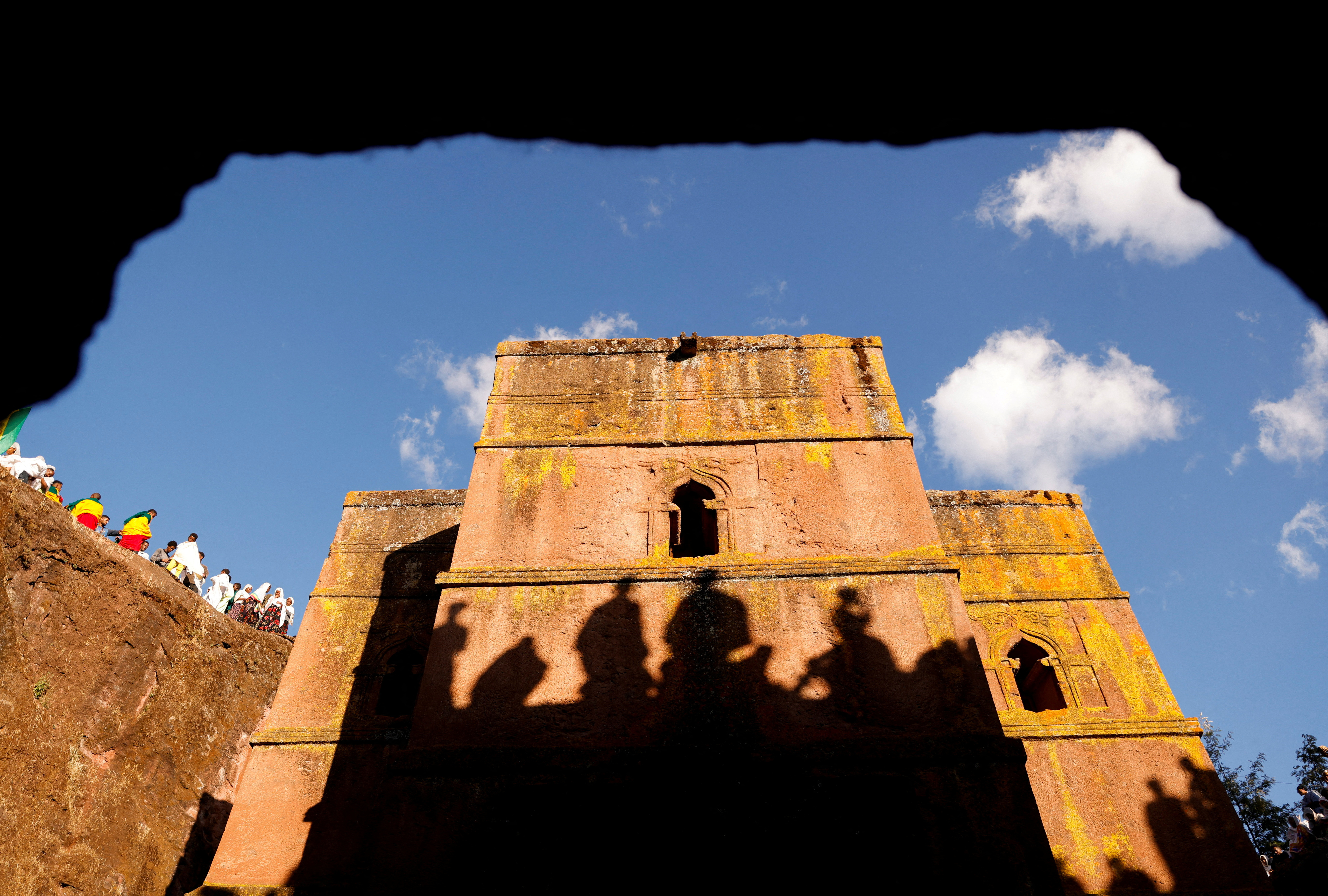 Ethiopian Orthodox pilgrims wait to attend the Ethiopian Christmas Eve celebration at the St.George Rock-Hewn church in Lalibela
