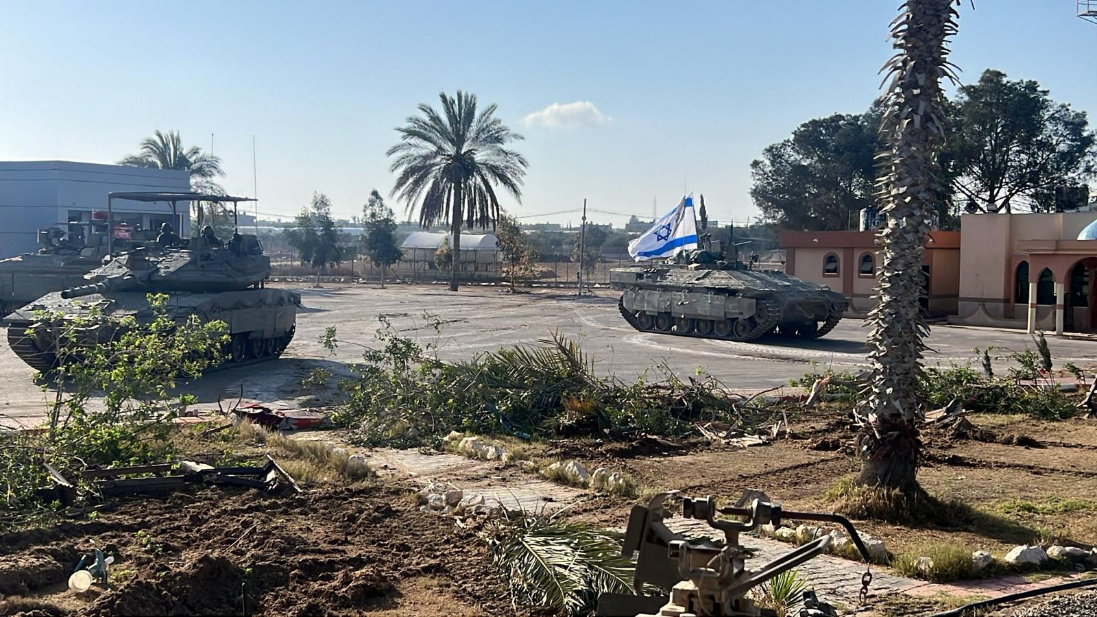 Israeli military vehicles operate in the Gazan side of the Rafah Crossing
