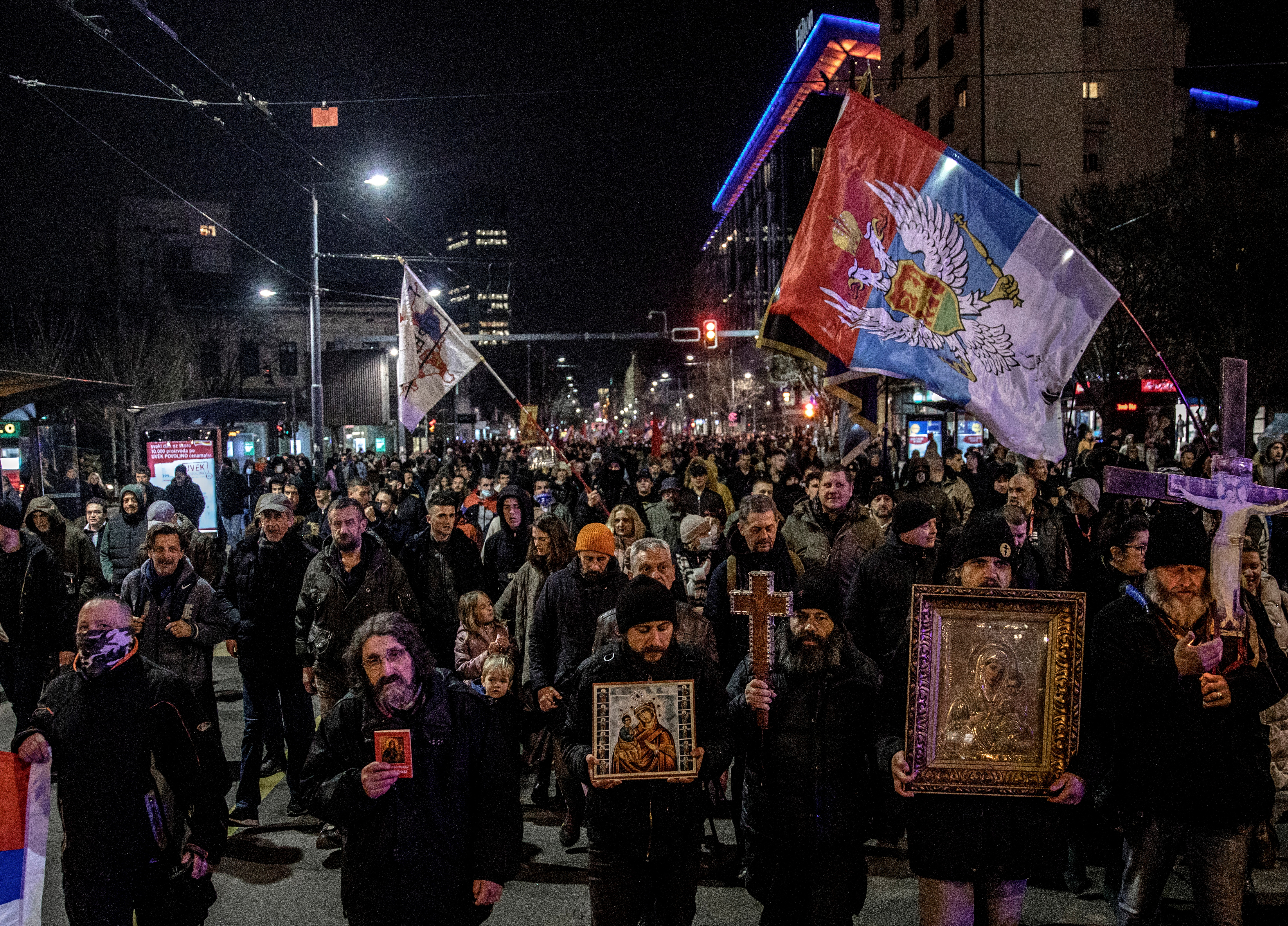 Pro-Russia protestors march through the streets in central Belgrade