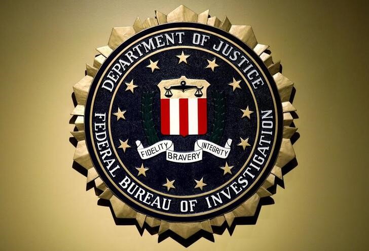 The Federal Bureau of Investigation seal is seen at FBI headquarters before a news conference by the FBI Director on the inspector general's report in Washington