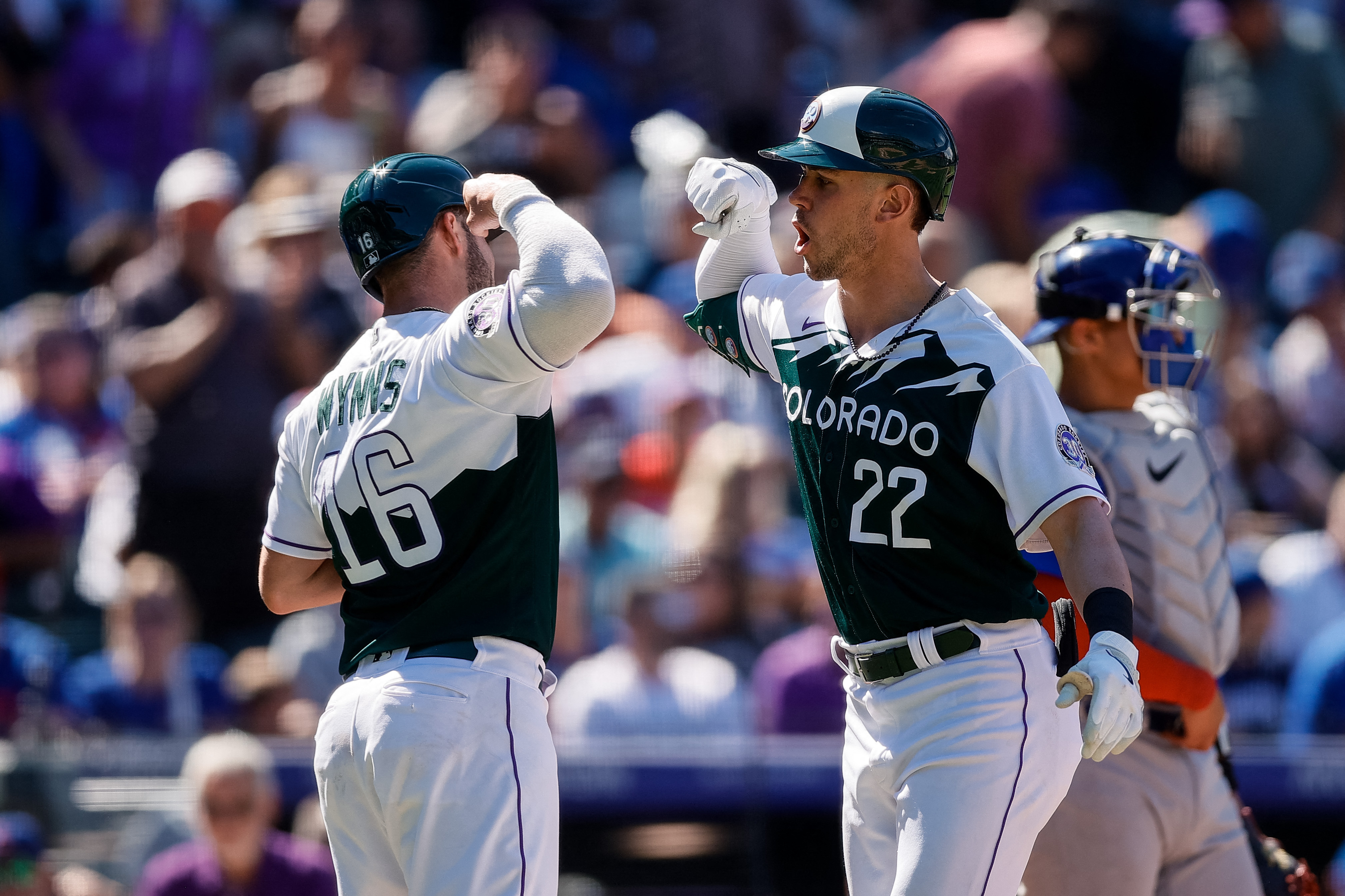 Four homers rally Rockies past Cubs, 7-3