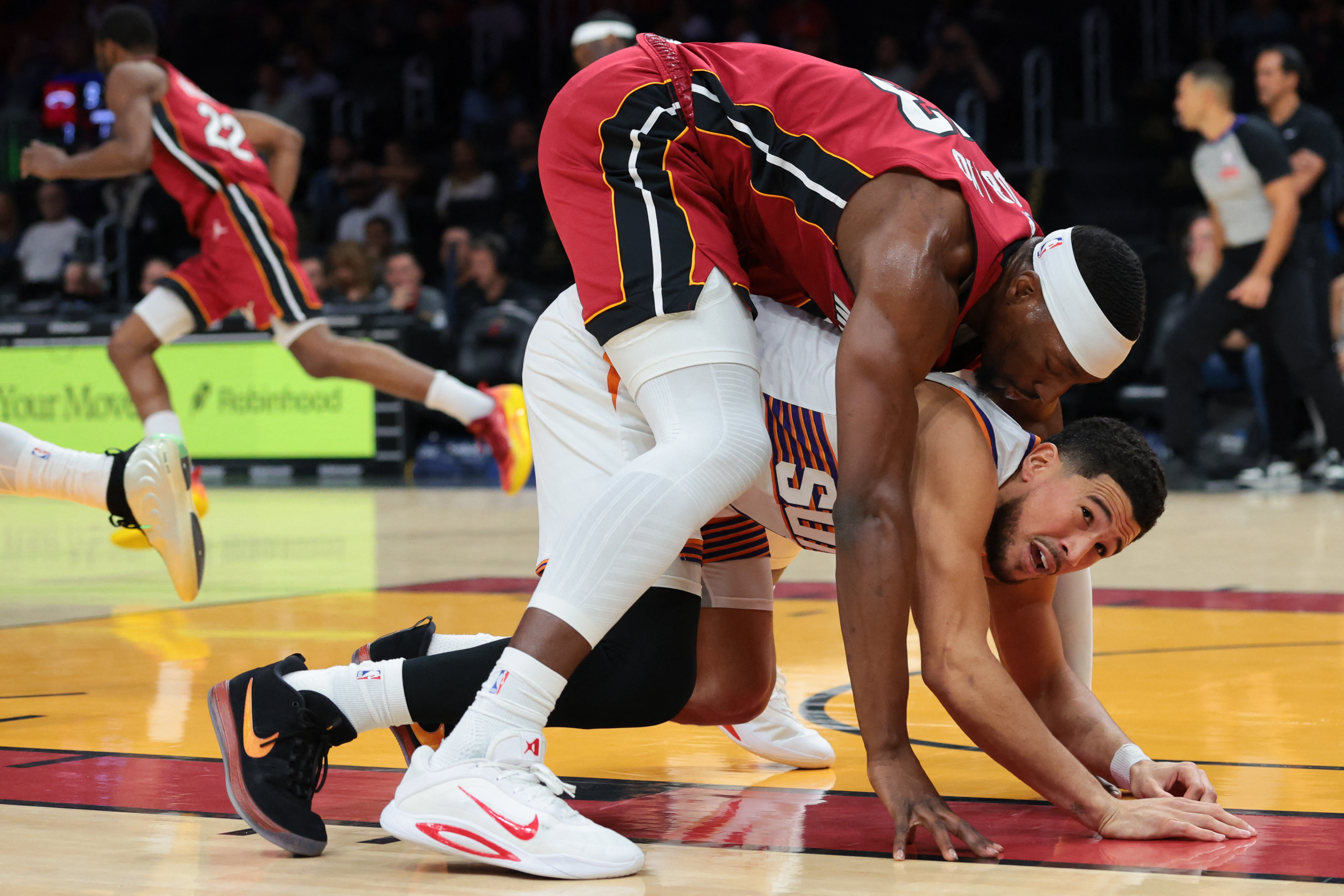 Bam Adebayo's strong closing surge guides Heat past Suns | Reuters
