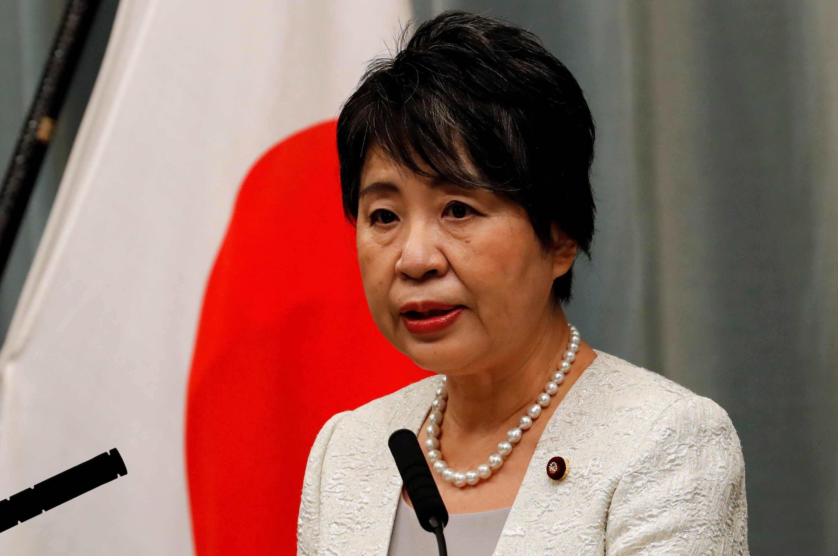 Japan's new cabinet reflects PM's focus on gender and defence | Reuters