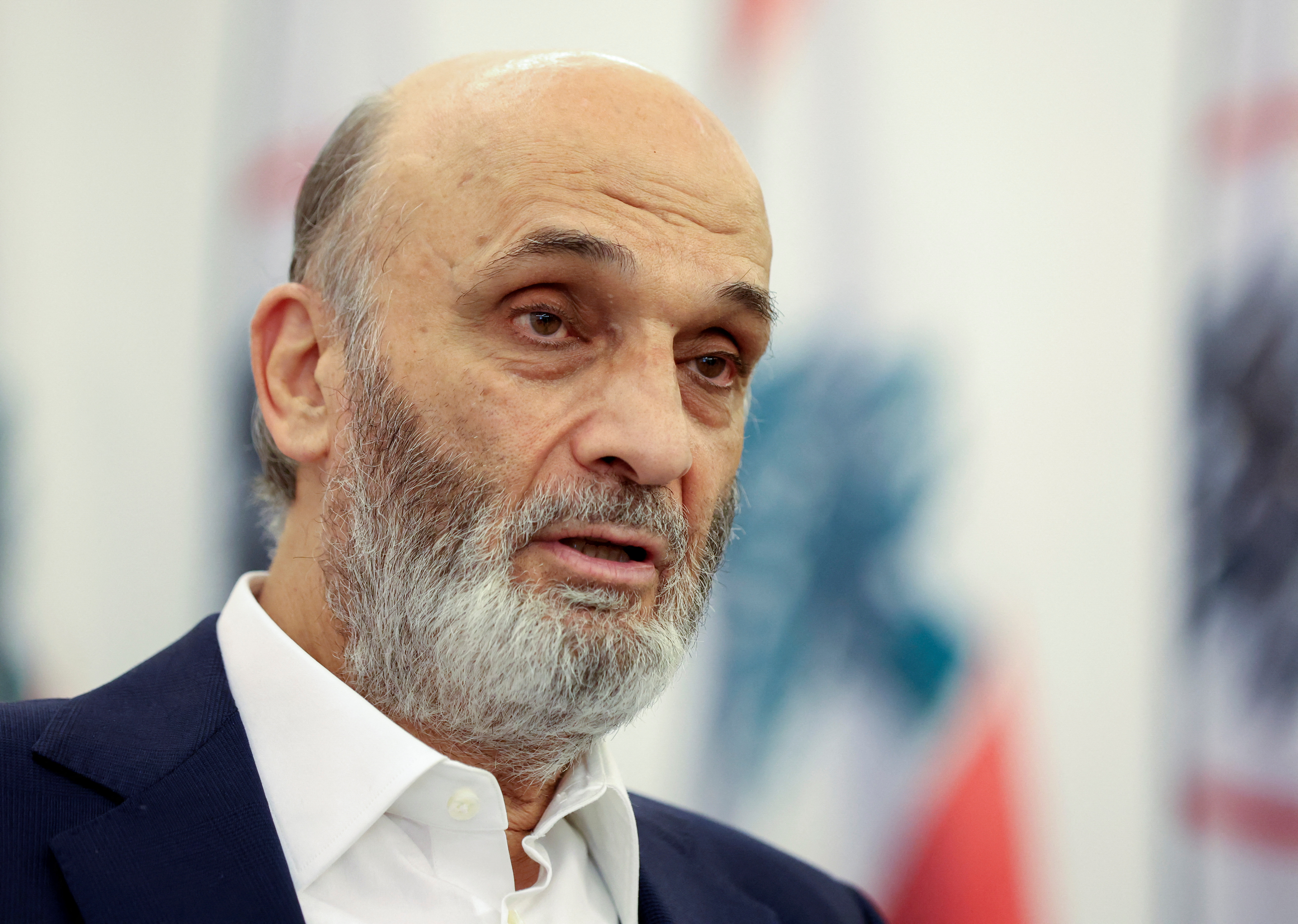 Samir Geagea, the head of the Christian Lebanese Forces party, speaks during an interview with Reuters at his residence in Maarab