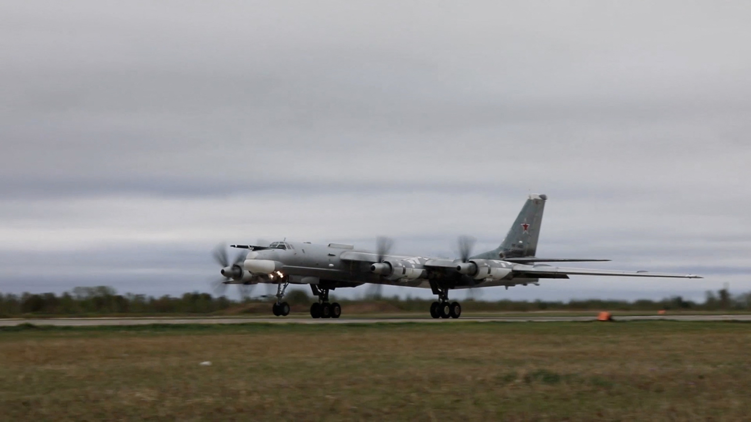 Russian Tu-95 strategic bomber flies during military exercises at an unidentified location