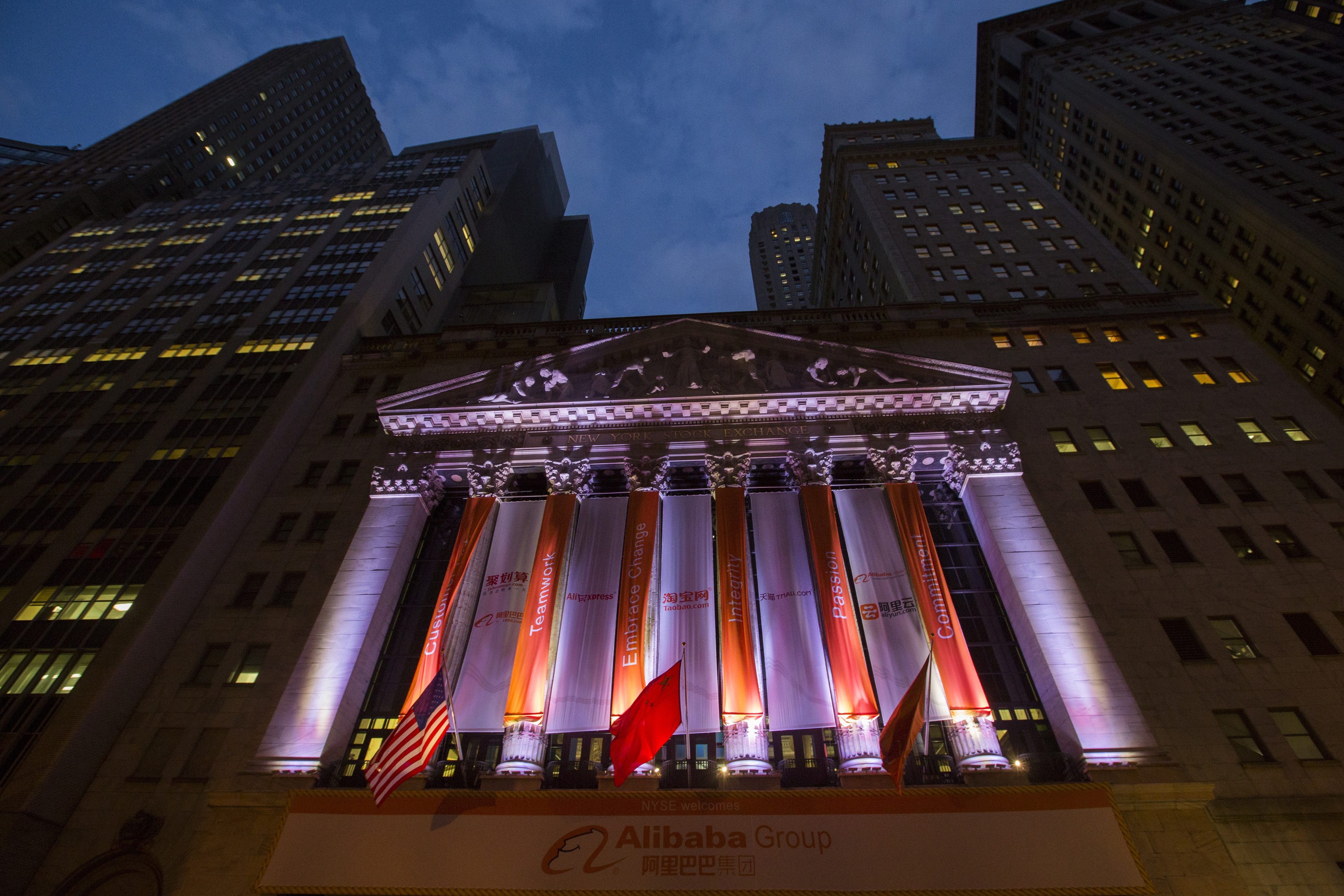 The sign showing the logo of Alibaba Group Holding is seen on the facade of the New York Stock Exchange before the company's initial public offering (IPO) September 19, 2014. REUTERS/Lucas Jackson