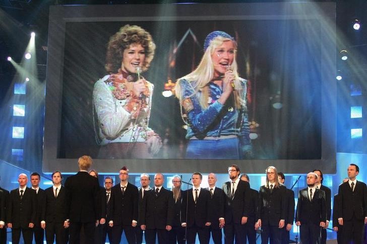 Giant screen shows a video of Agneta Faeltskog (R) and Anni-Frid Lyngstad of Swedish pop group Abba singing their 1974 winning song 'Waterloo' during a rehearsal in Copenhagen's Forum October 22, 2005. REUTERS/Scanpix/Jens Norgaard Larsen