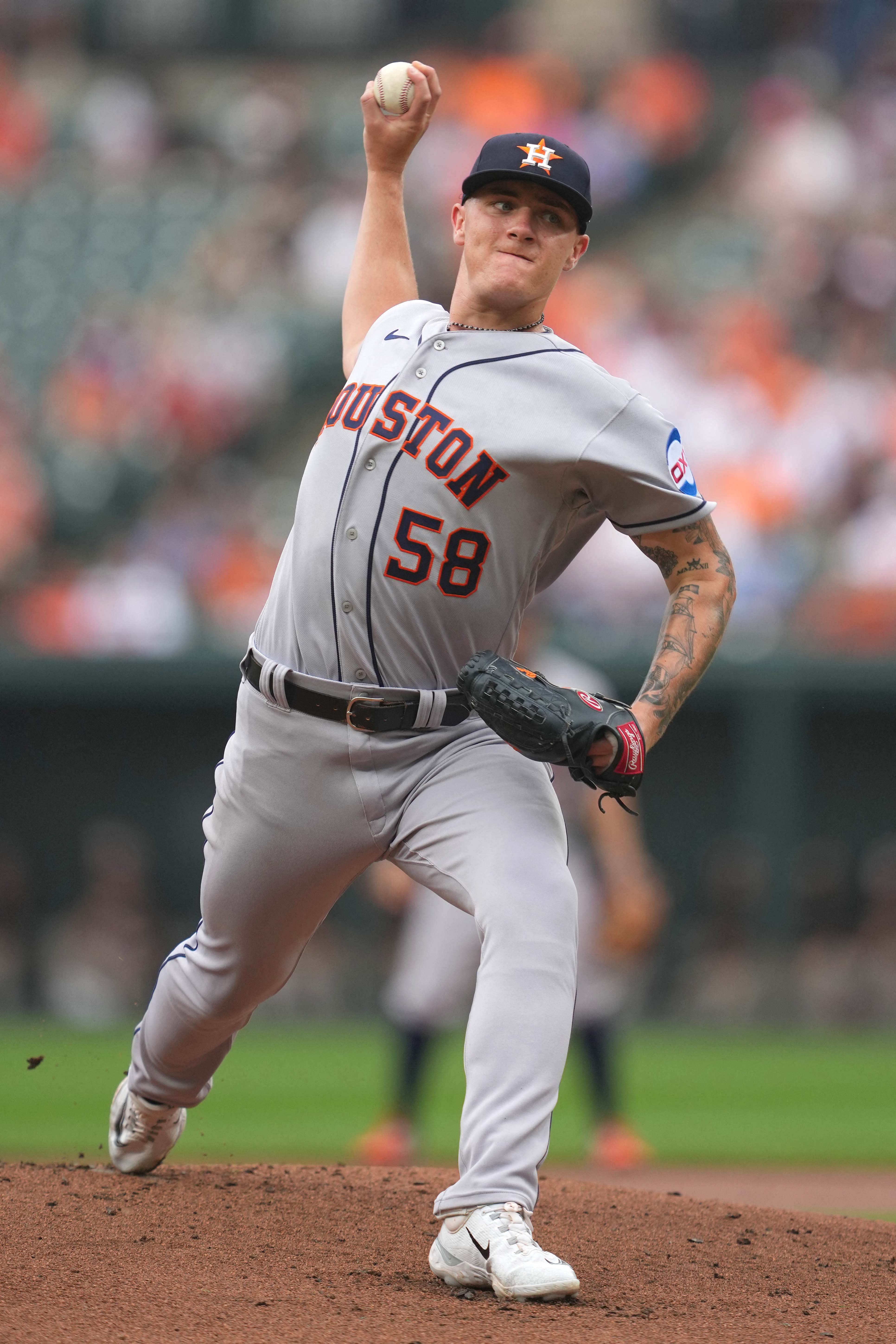 Baltimore Orioles pitcher Dean Kremer, right, is congratulated by catcher  Adley Rutschman after pitching a 6-0 shutout against the Houston Astros in  a baseball game, Friday, Sept. 23, 2022, in Baltimore. (AP