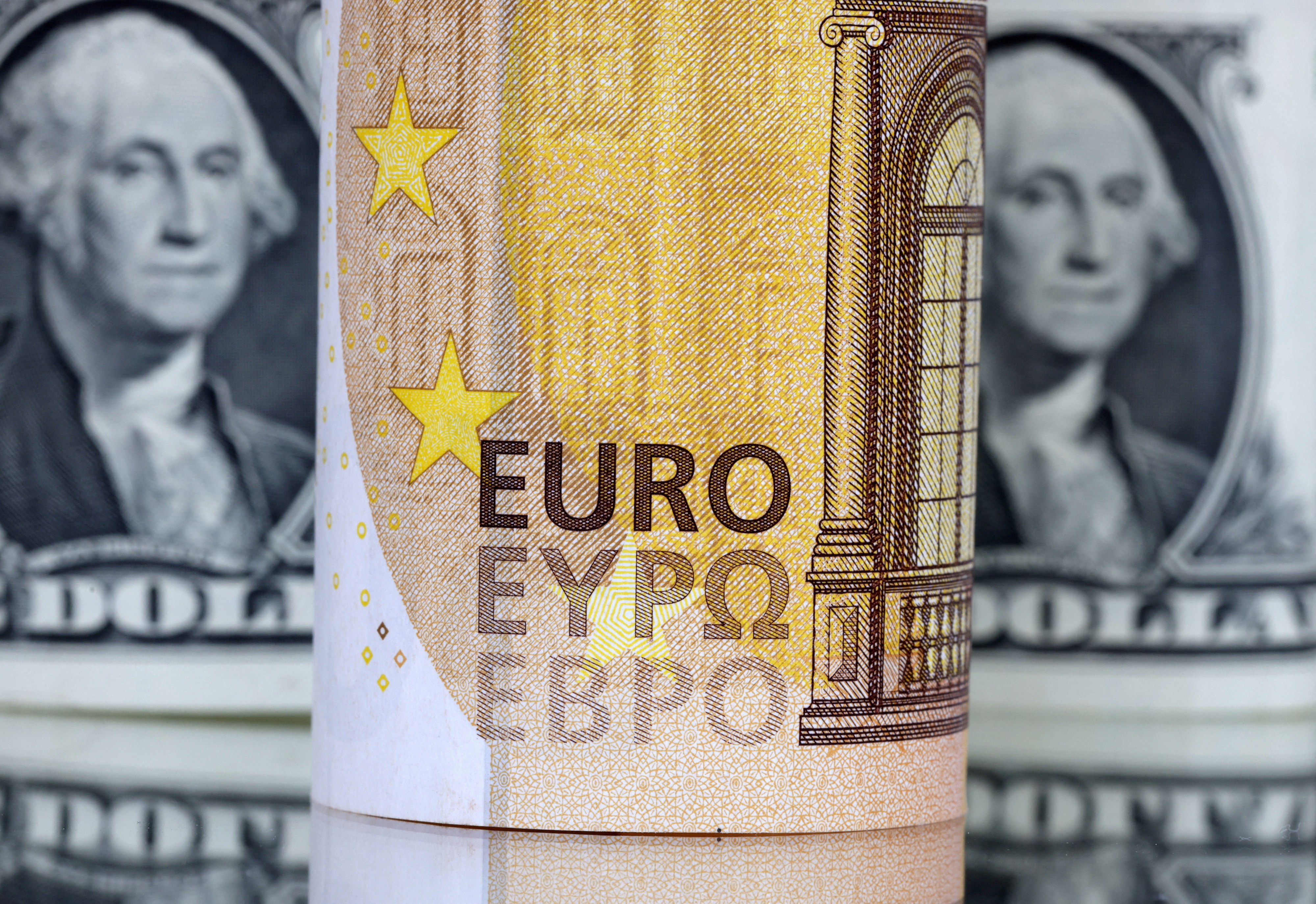 Euro extends fall to 12-year low as bond yields drop further