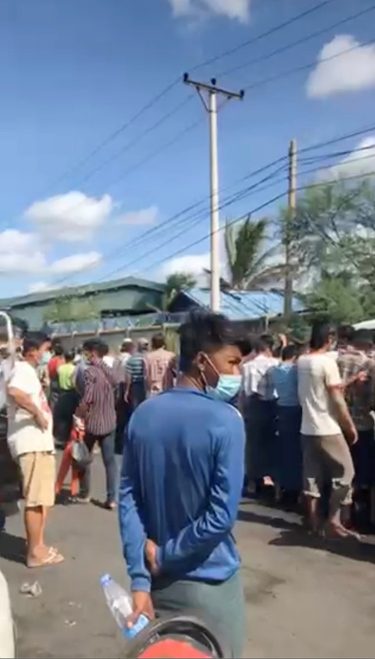 People queue for oxygen as COVID-19 cases surge in Mandalay