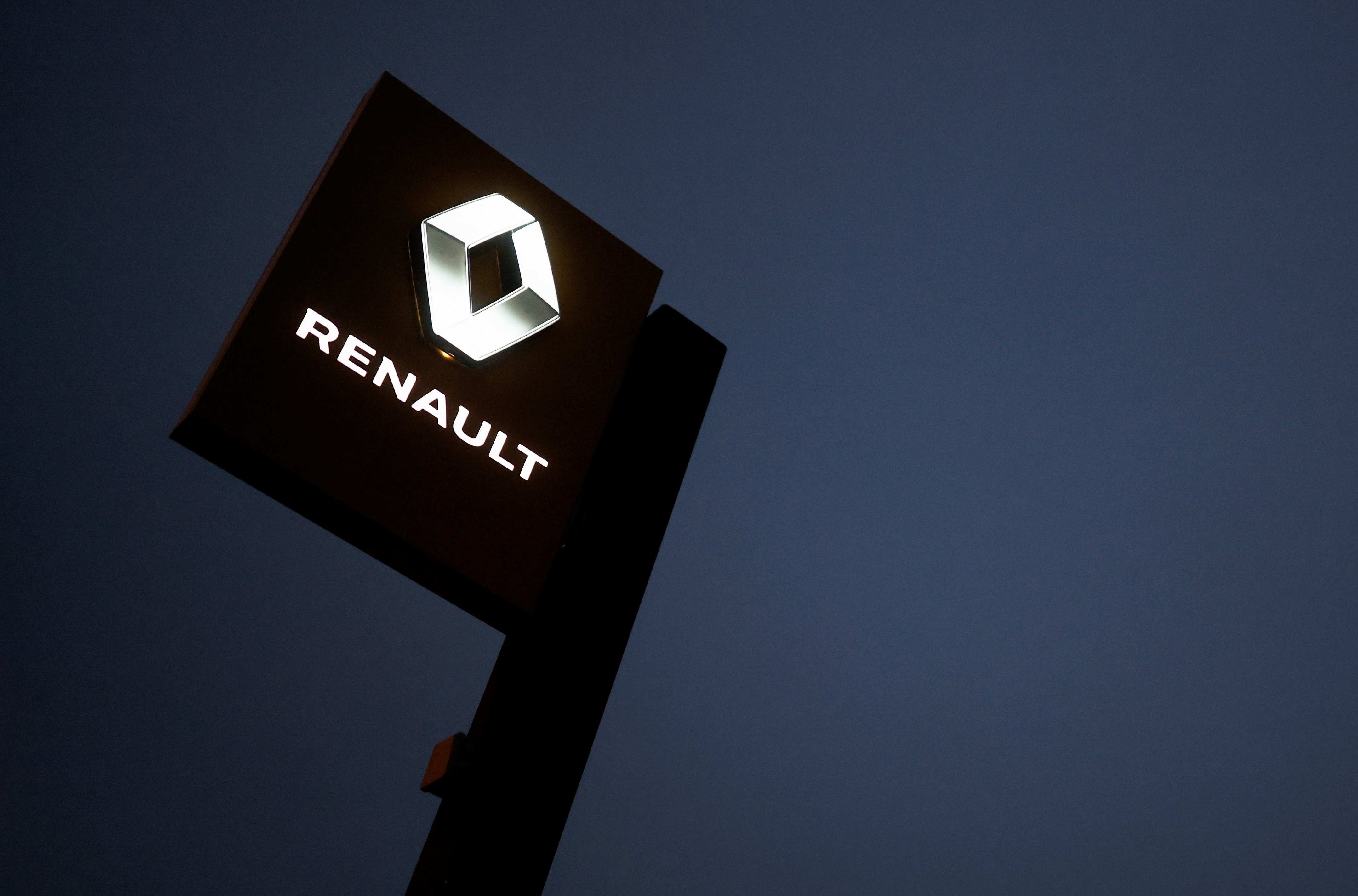 The logo of Renault carmaker is pictured at a dealership in Vertou