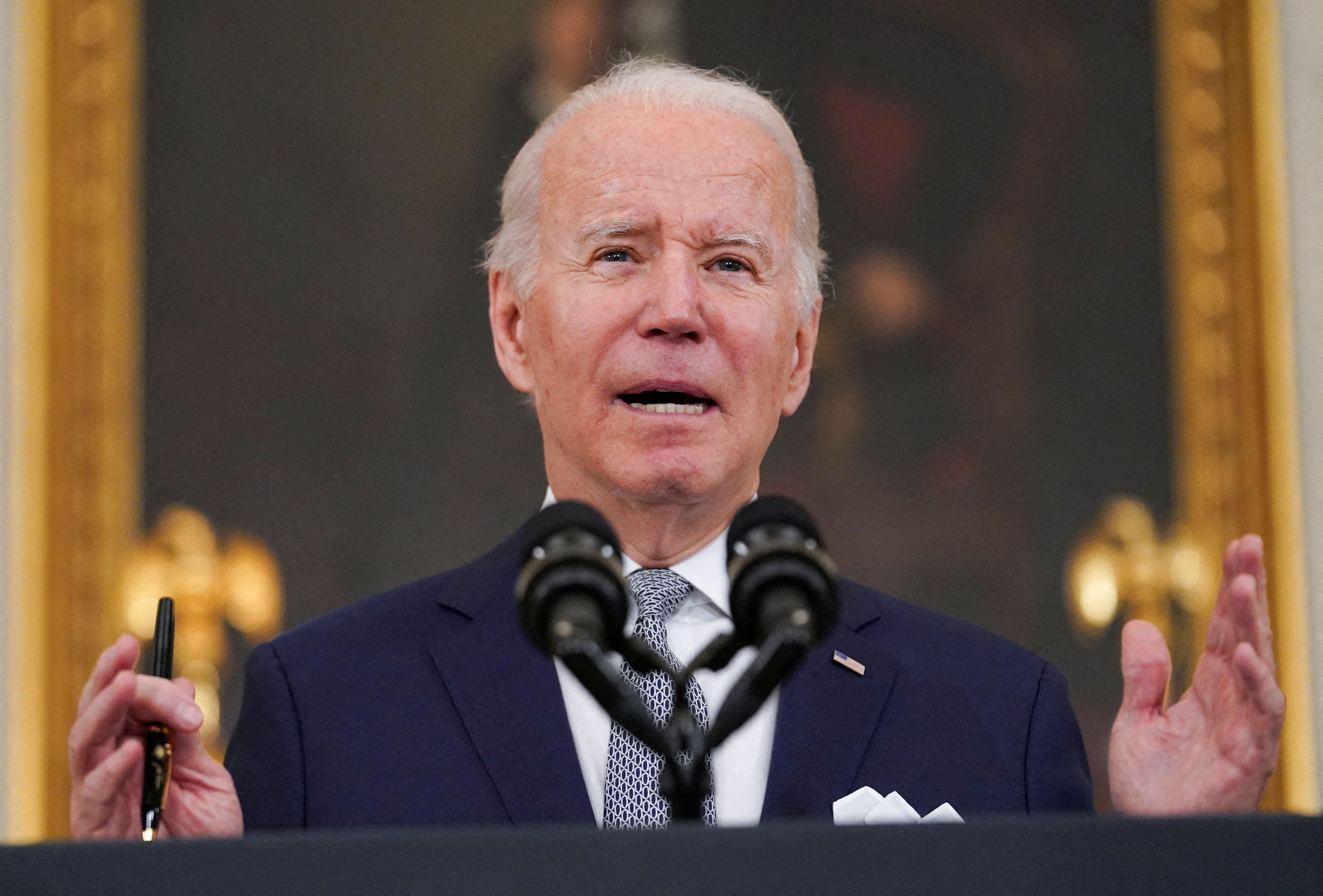 U.S. President Joe Biden delivers remarks on the December 2021 jobs report during a speech in the State Dining Room at the White House in Washington, U.S., January 7, 2022. REUTERS/Kevin Lamarque