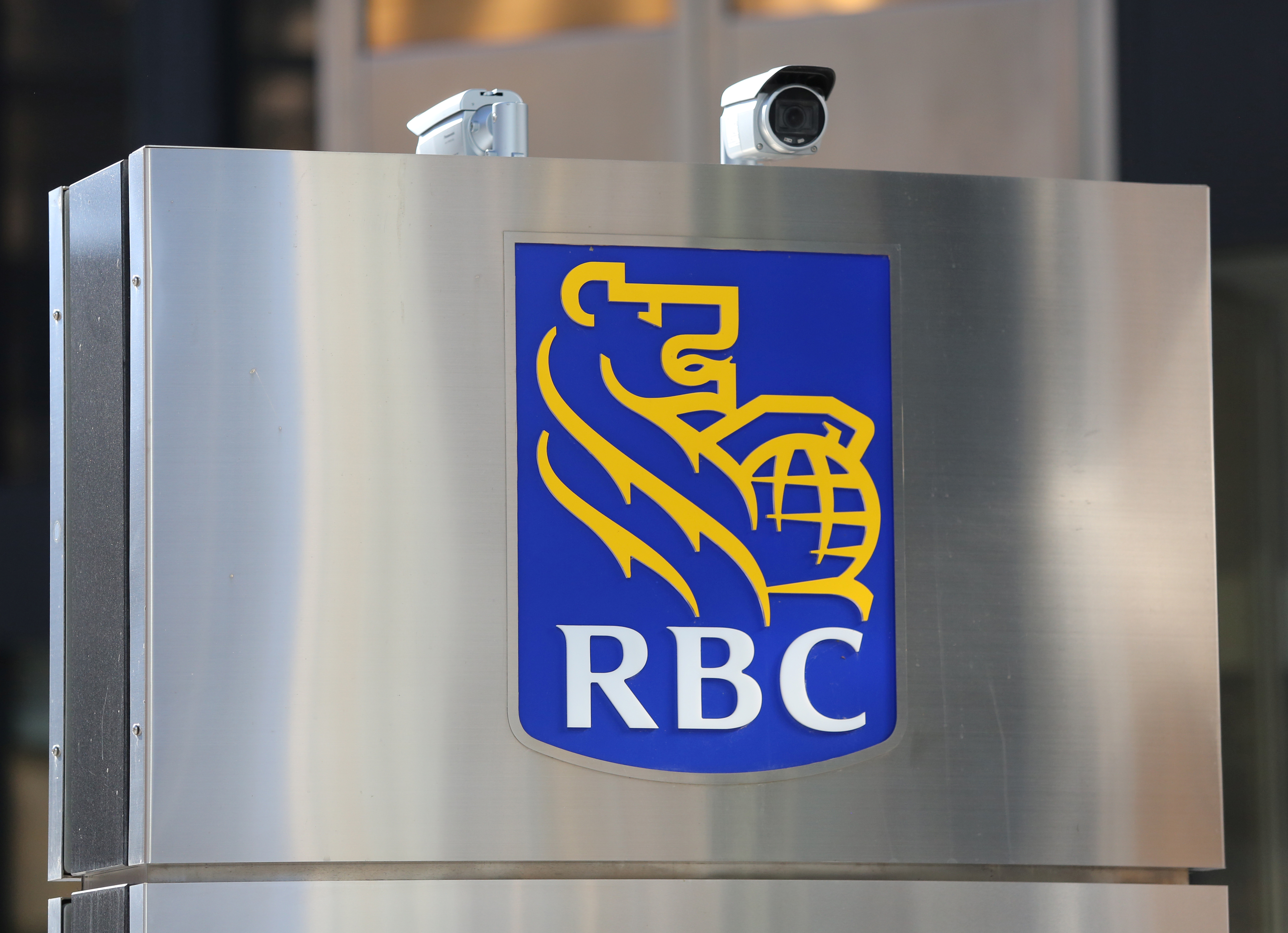 Security cameras point outside the Royal Bank of Canada (RBC) headquarters in Toronto