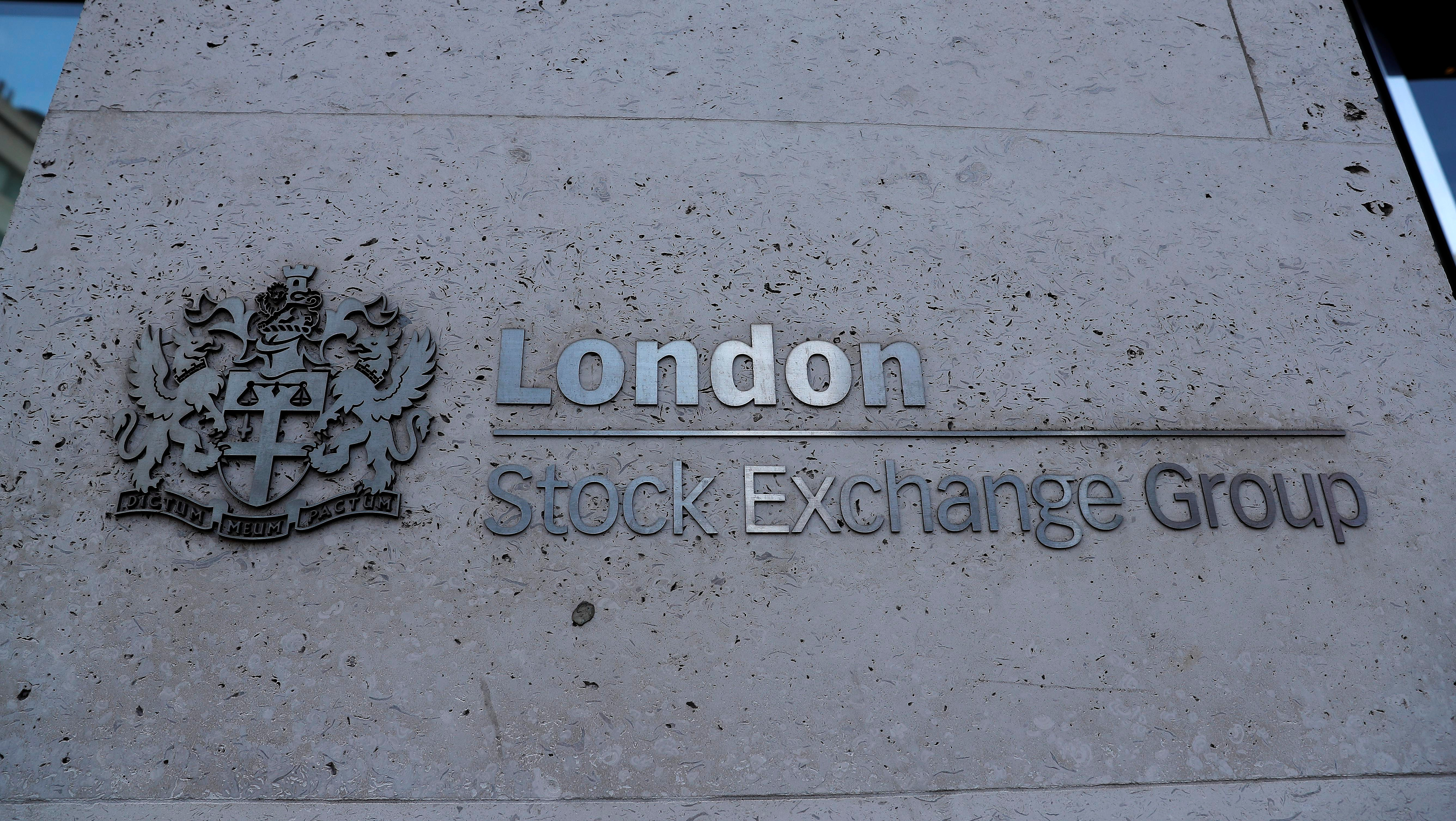 FIEL PHOTO: Signage is seen outside the entrance of the London Stock Exchange in London, Britain. Aug 23, 2018. REUTERS/Peter Nicholls