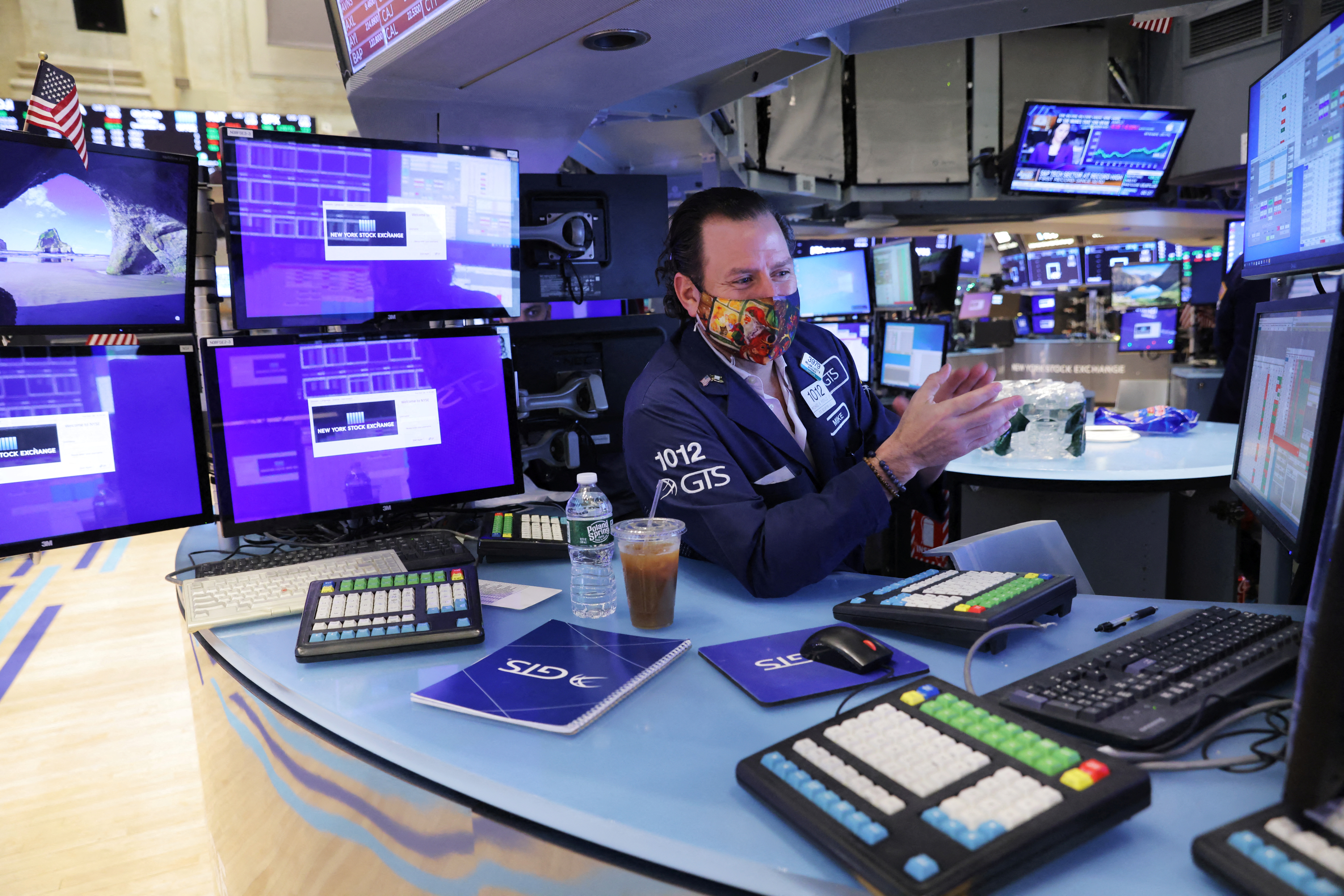 A trader works on the trading floor at the New York Stock Exchange (NYSE) in Manhattan