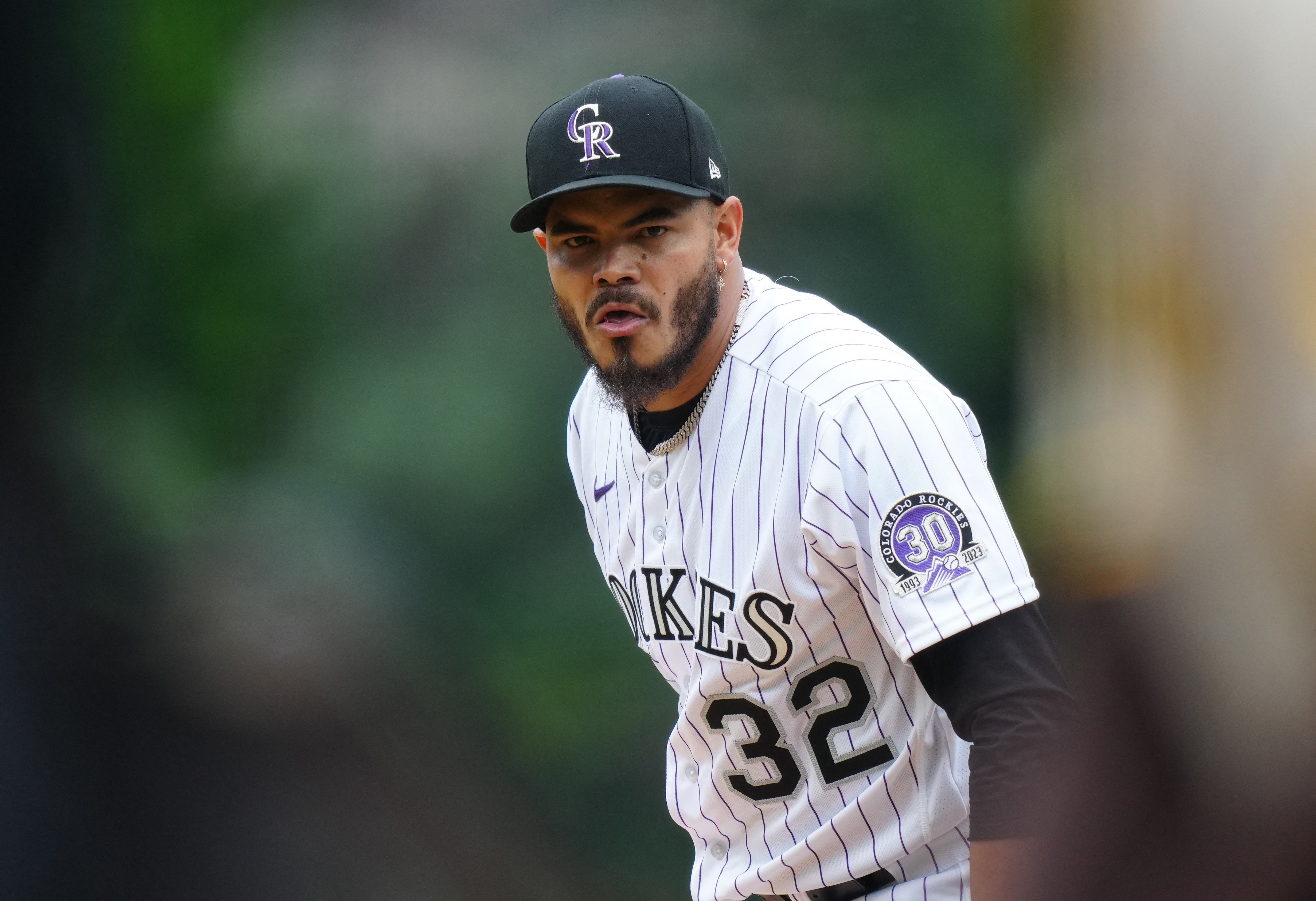 Rockies belt two ninth-inning HRs -- more than an hour apart -- to beat  Padres