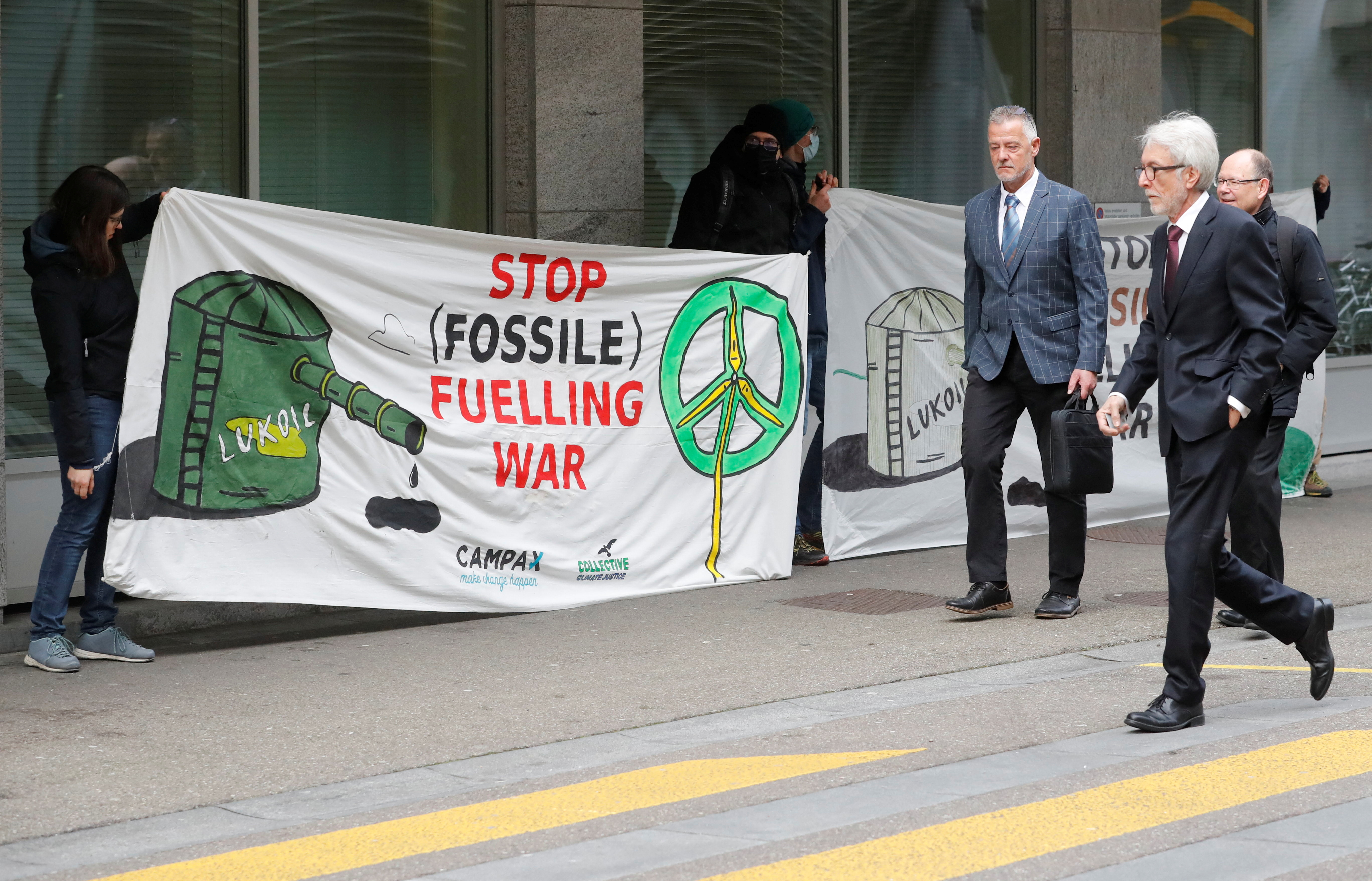 Climate activists of Campax and Collective Climate Justice protest ahead of a UBS general shareholder meeting in Zurich