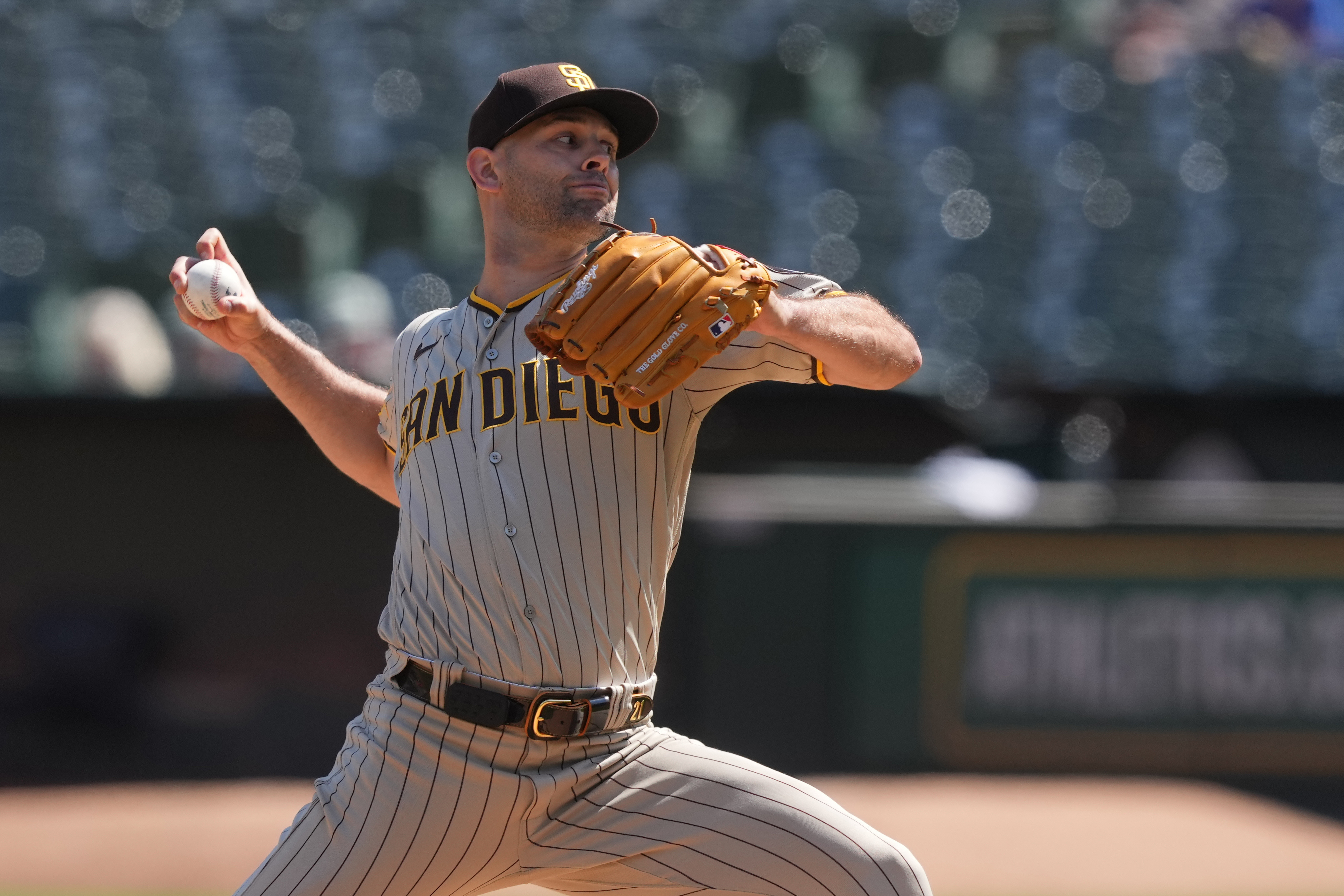 San Diego Padres Jose Azocar takes off his Nike batting gloves