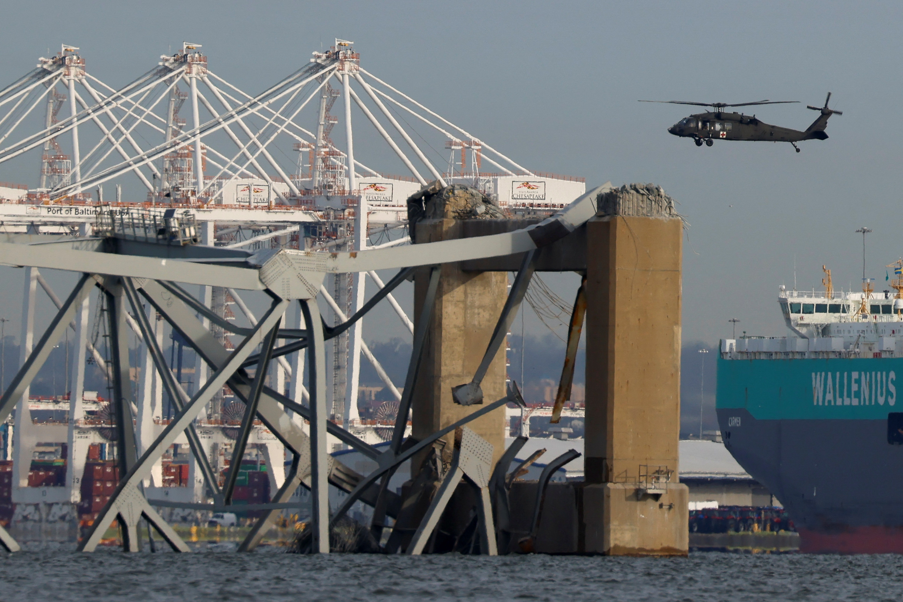 Baltimore bridge collapse sends vehicles tumbling into water - March 26 ...