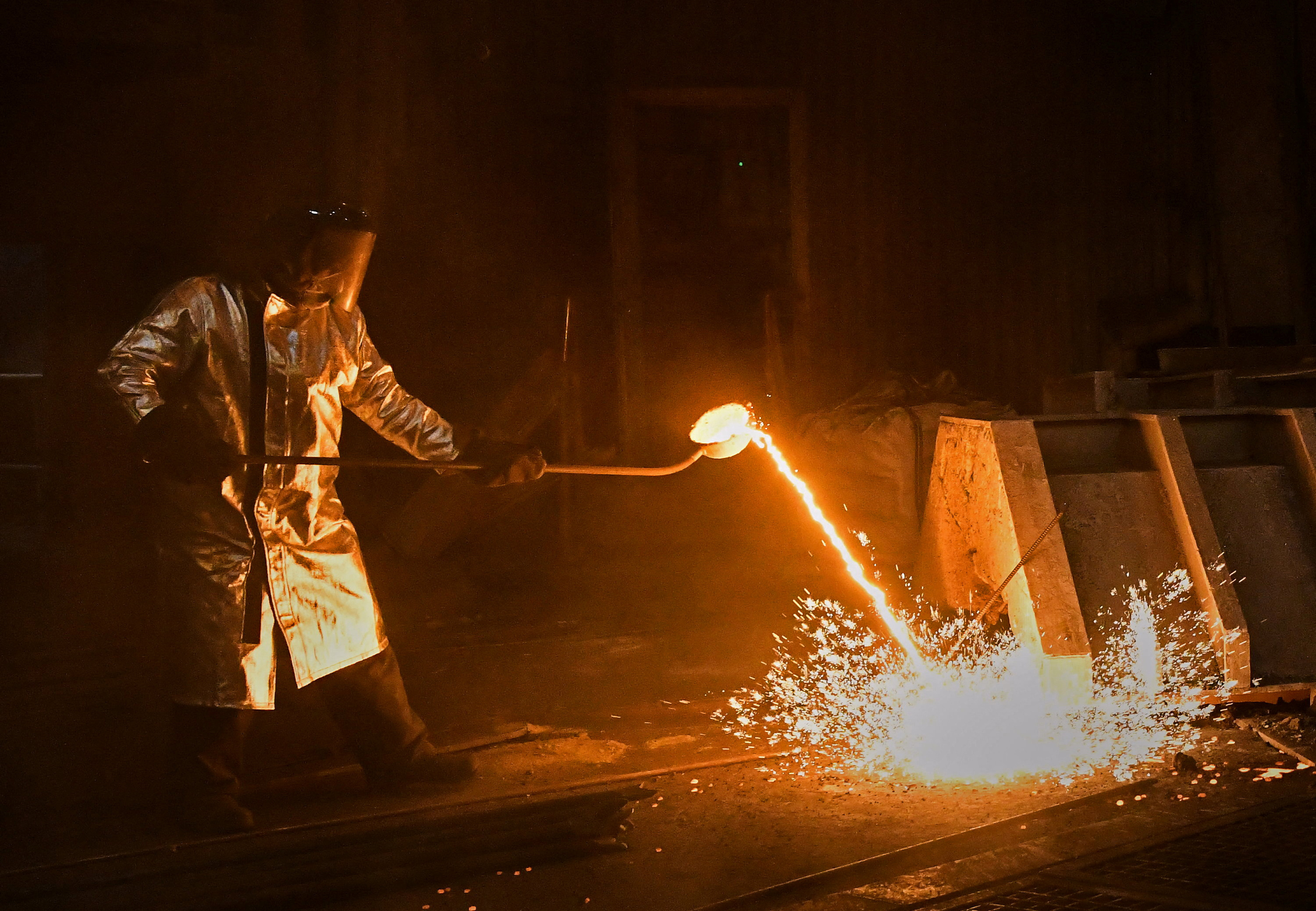 An employee works in a blast furnace shop at Magnitogorsk Iron and Steel Works