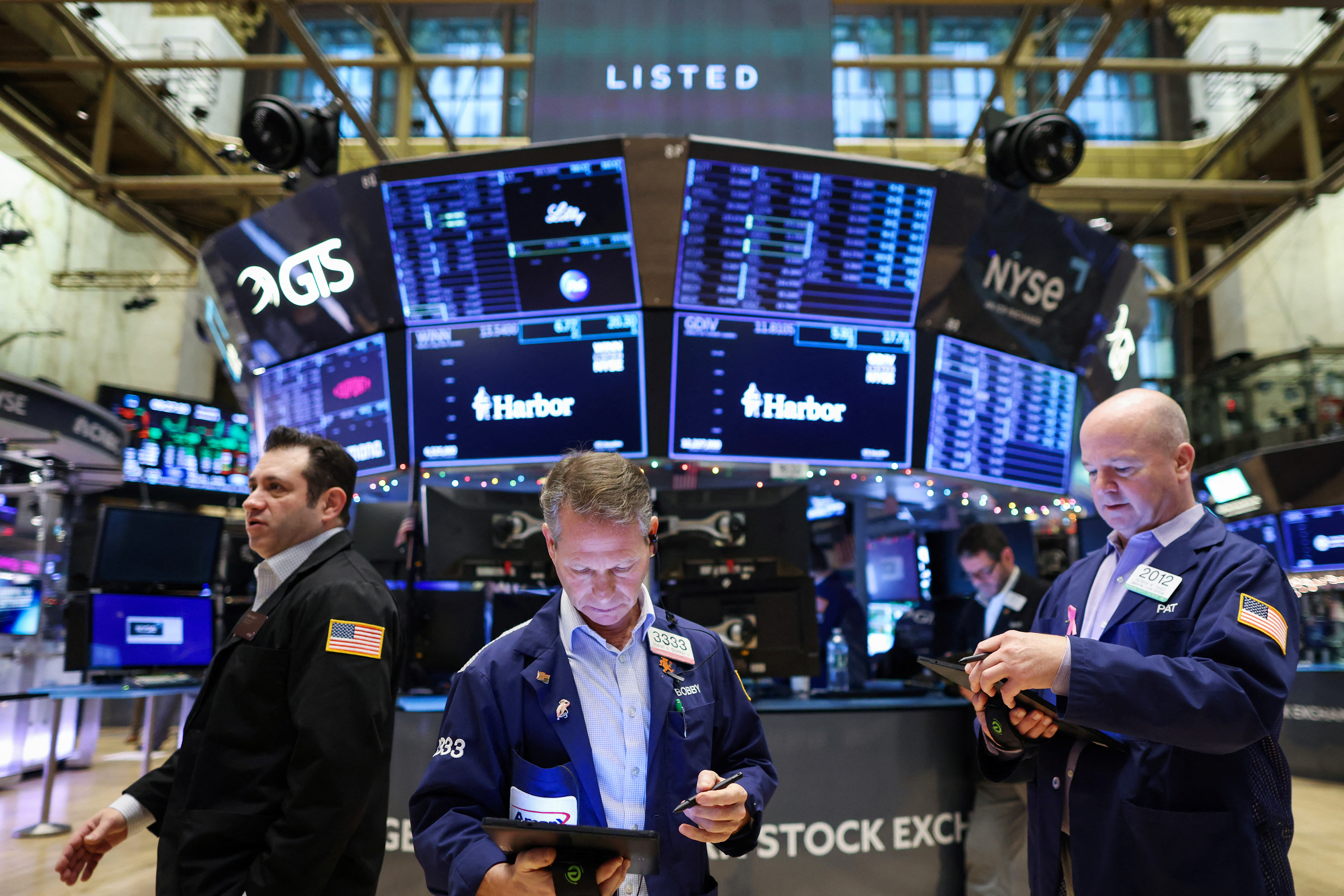 Traders work on the floor of the New York Stock Exchange (NYSE) in New York