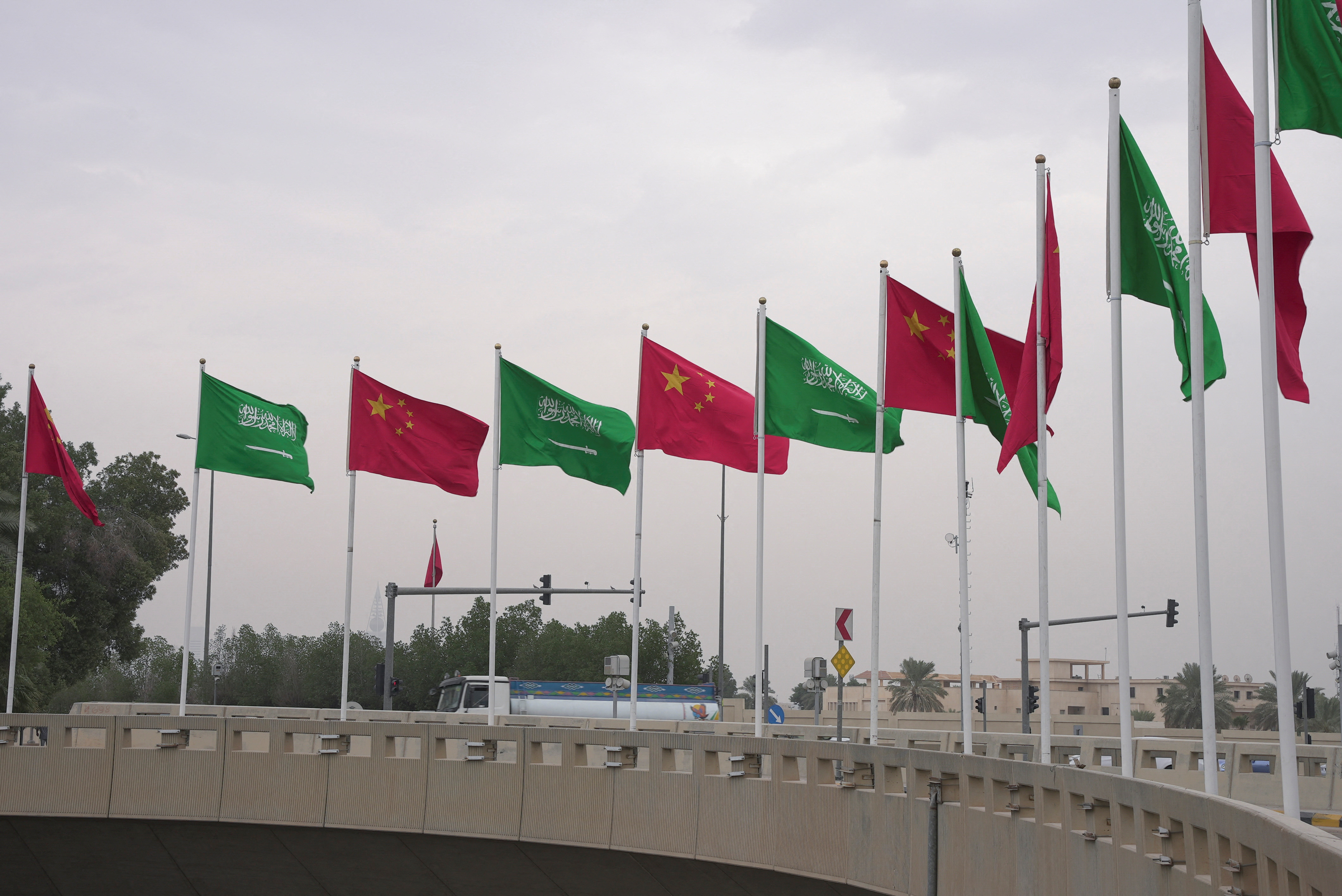 Flags of participating countries are pictured ahead of the China-Arab summit in Riyadh