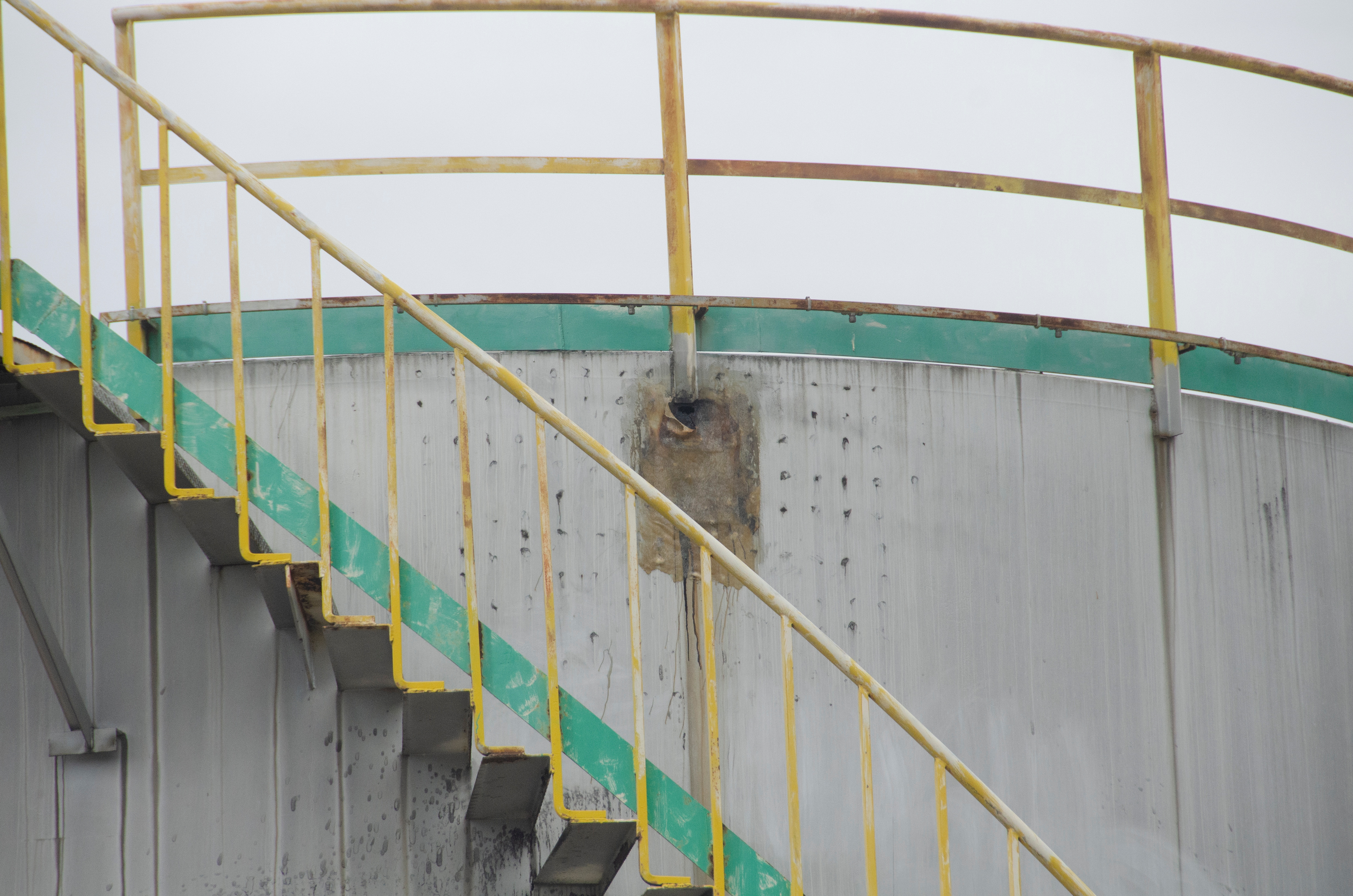 A handout photograph provided to Reuters by CATF shows a small hole on the side of a storage tank at the Eni gas plant near Pineto