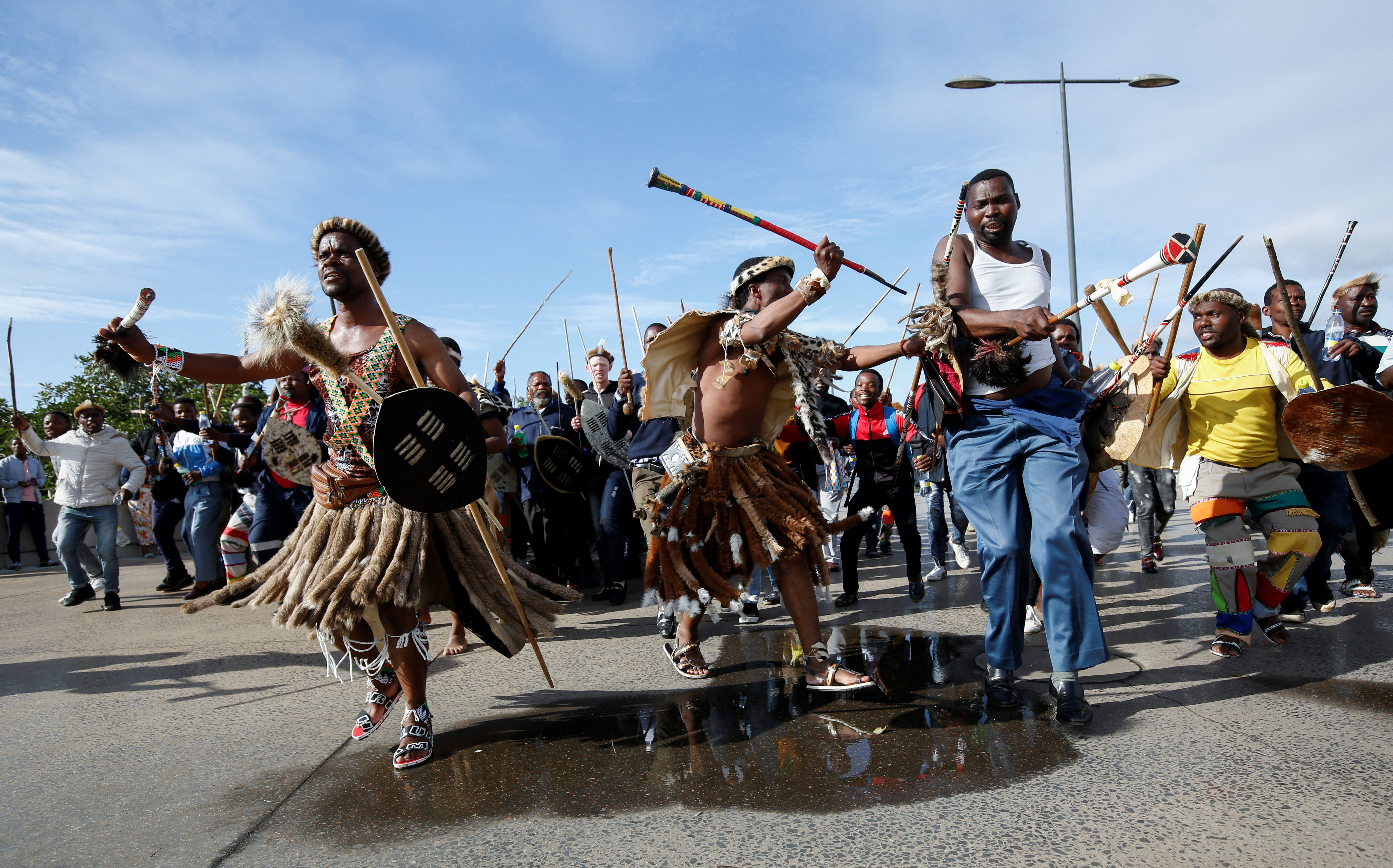 Supporters of new AmaZulu King Misuzulu kaZwelithini arrive ahead of the final ceremony of his coronation in Durban