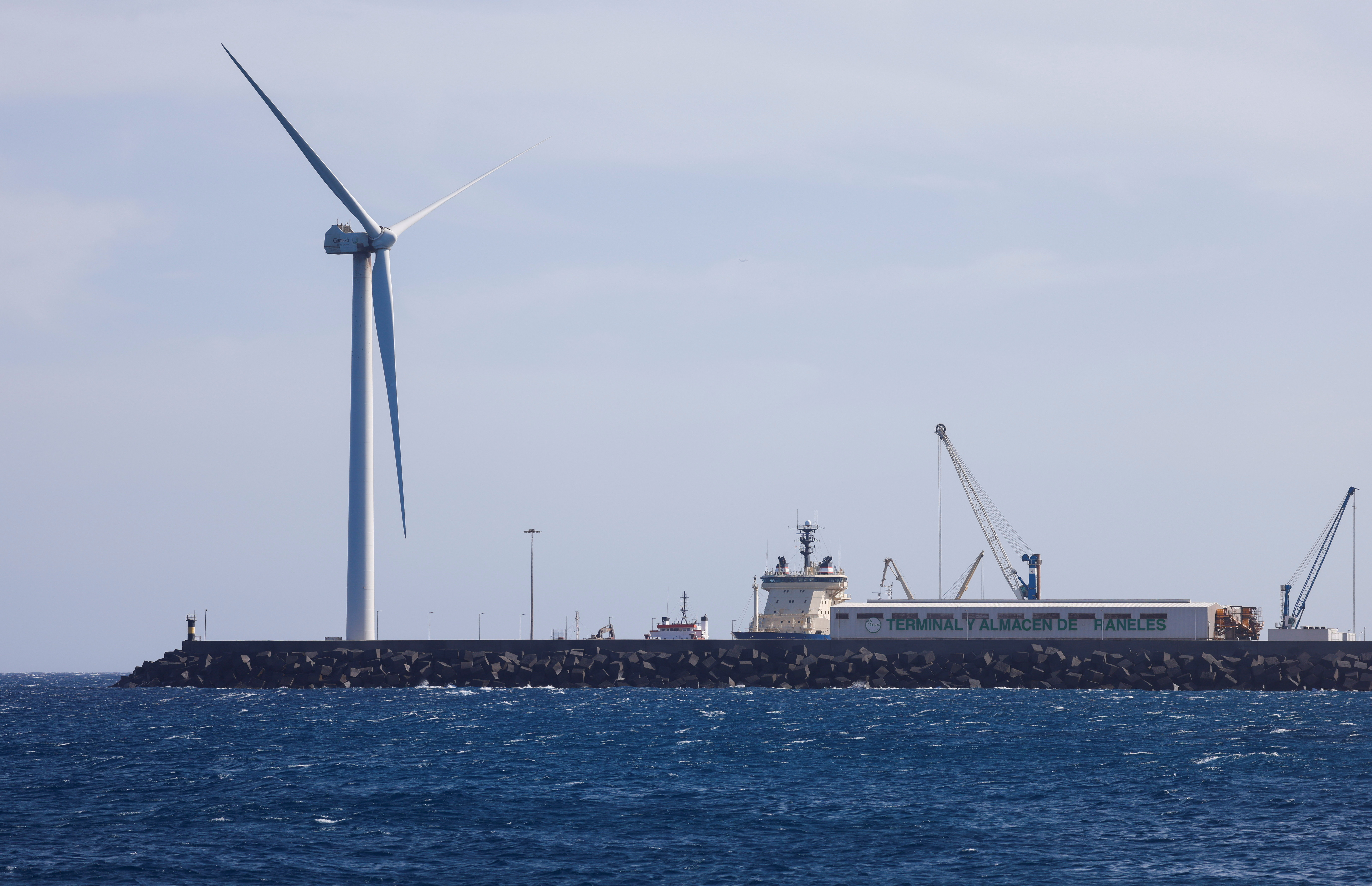 A wind turbine of the Siemens Gamesa company located at the Port of Arinaga is seen from Arinaga beach on Gran Canaria Island