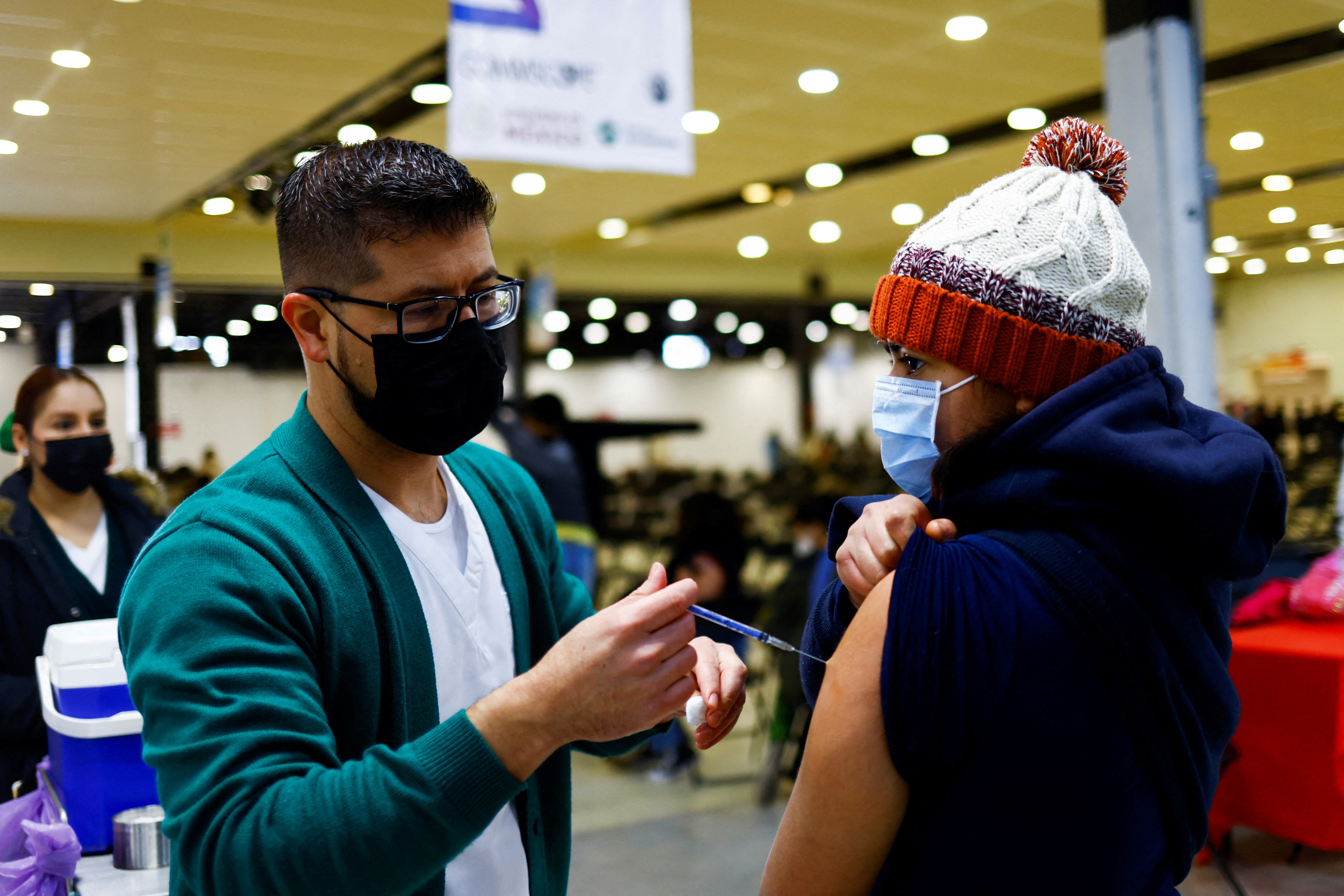 Young people receive vaccination against the coronavirus disease (COVID-19) in Ciudad Juarez