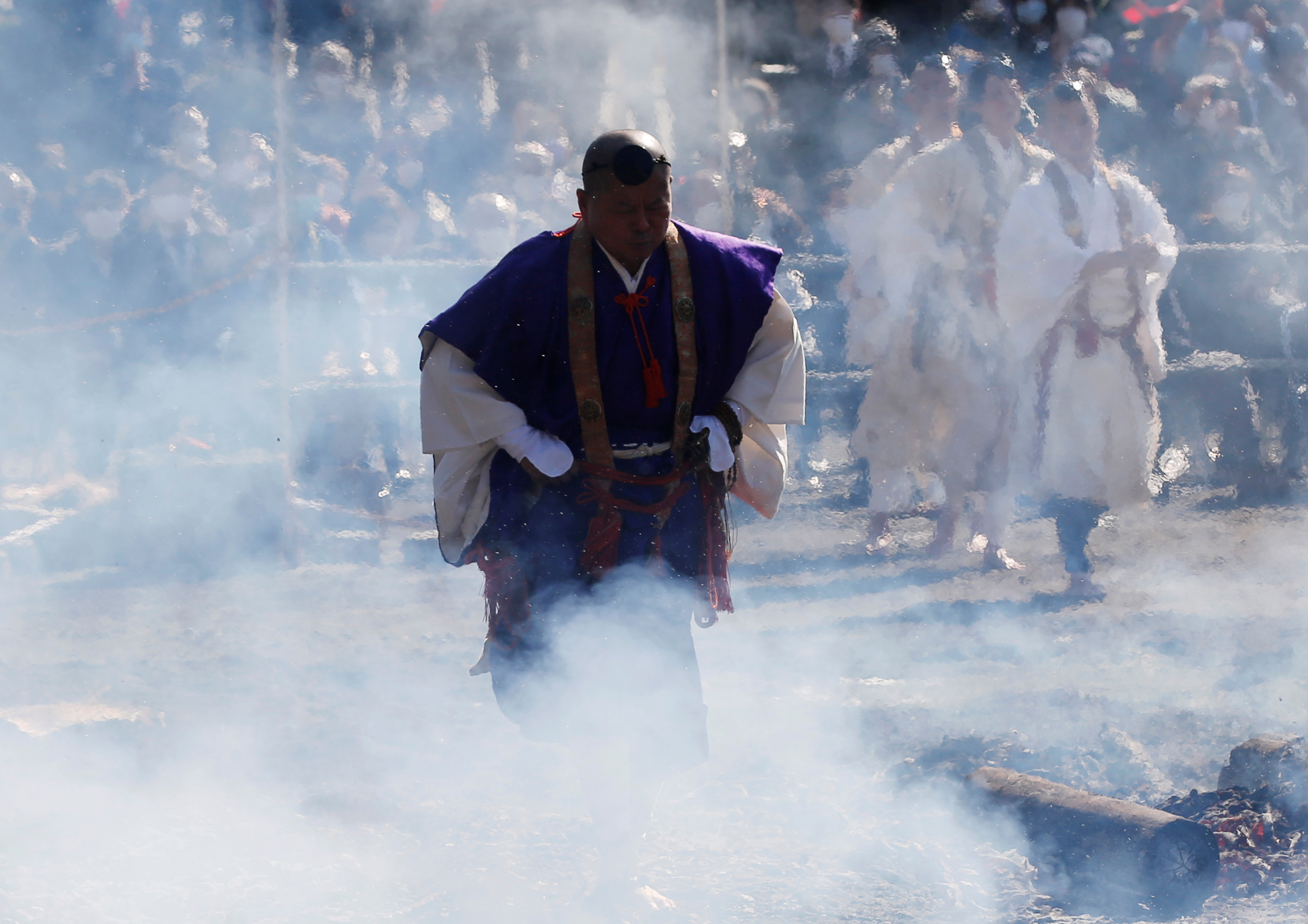 Japan Worshippers Brave Smouldering Coals To Pray For Safety Reuters