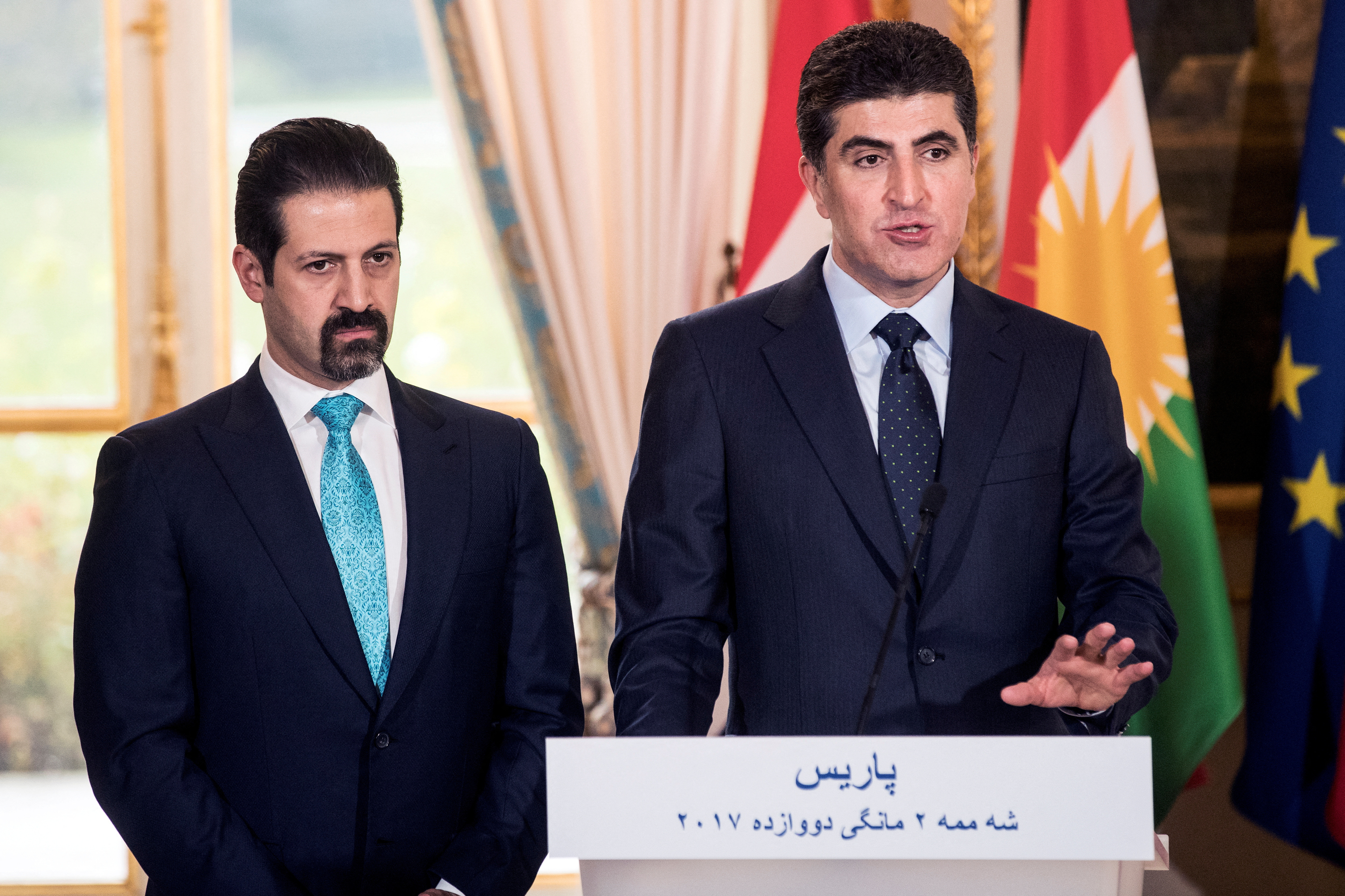 Kurdish region's Prime Minister Nechirvan Barzani and Iraqi Kurdistan’s Deputy Prime Minister Qubad Talabani attend a press conference at the Elysee Palace in Paris