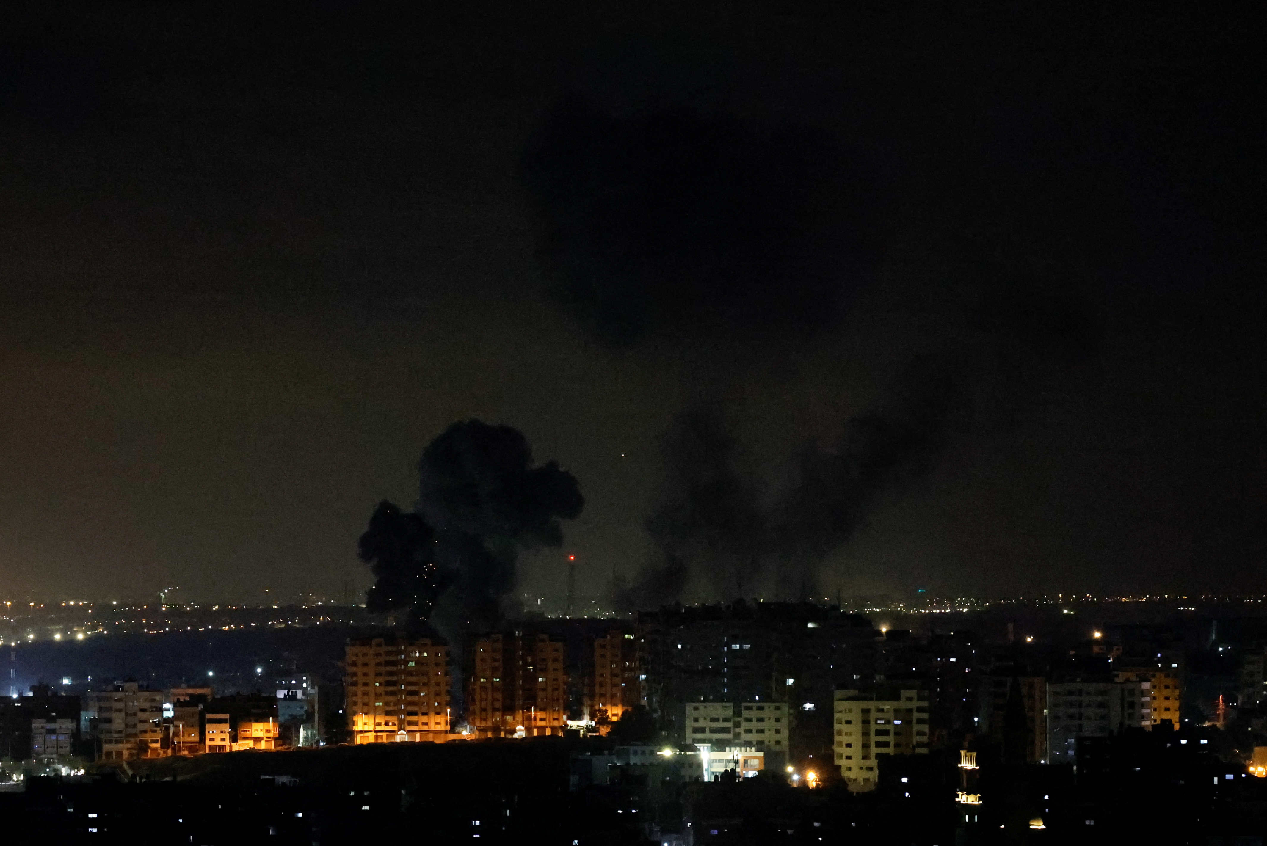 Smoke rises following an Israeli air strike in Gaza