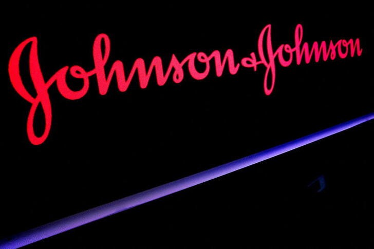 FILE PHOTO: The Johnson & Johnson logo is displayed on a screen on the floor of the NYSE in New York
