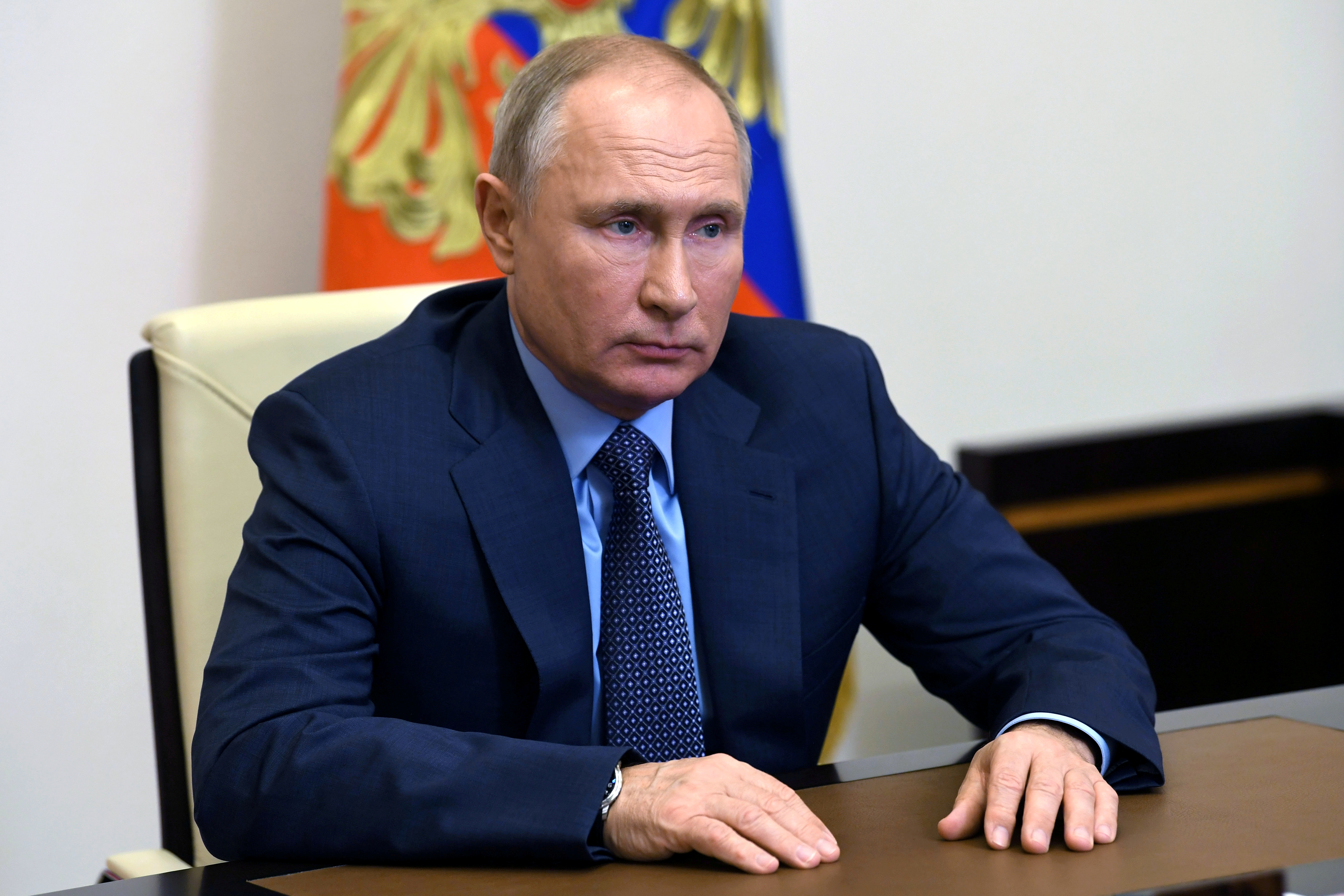 Russian President Vladimir Putin takes part in a video conference at the Novo-Ogaryovo state residence outside Moscow