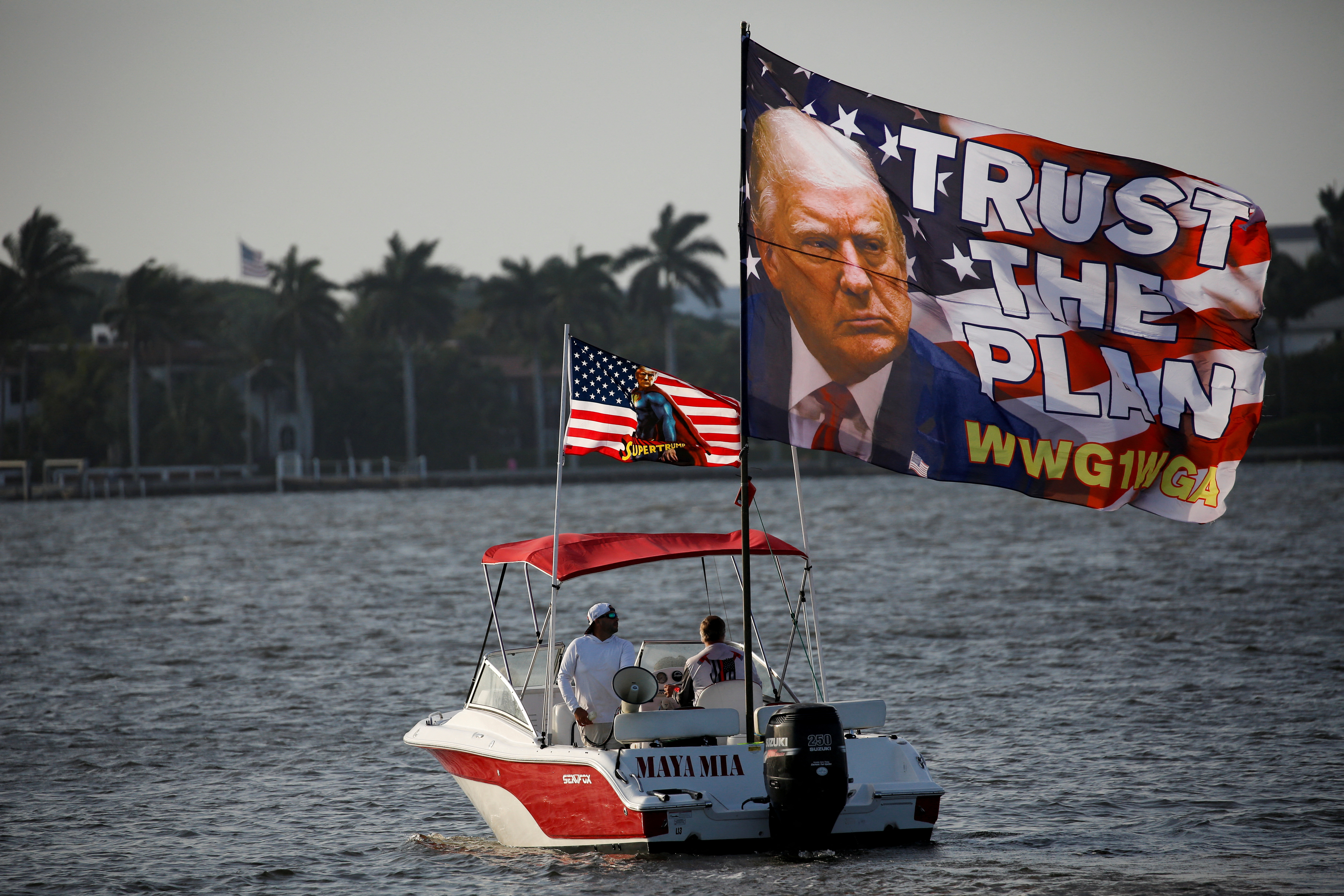 Supporters of former U.S. President Donald Trump gather outside his Mar-a-Lago resort in Palm Beach