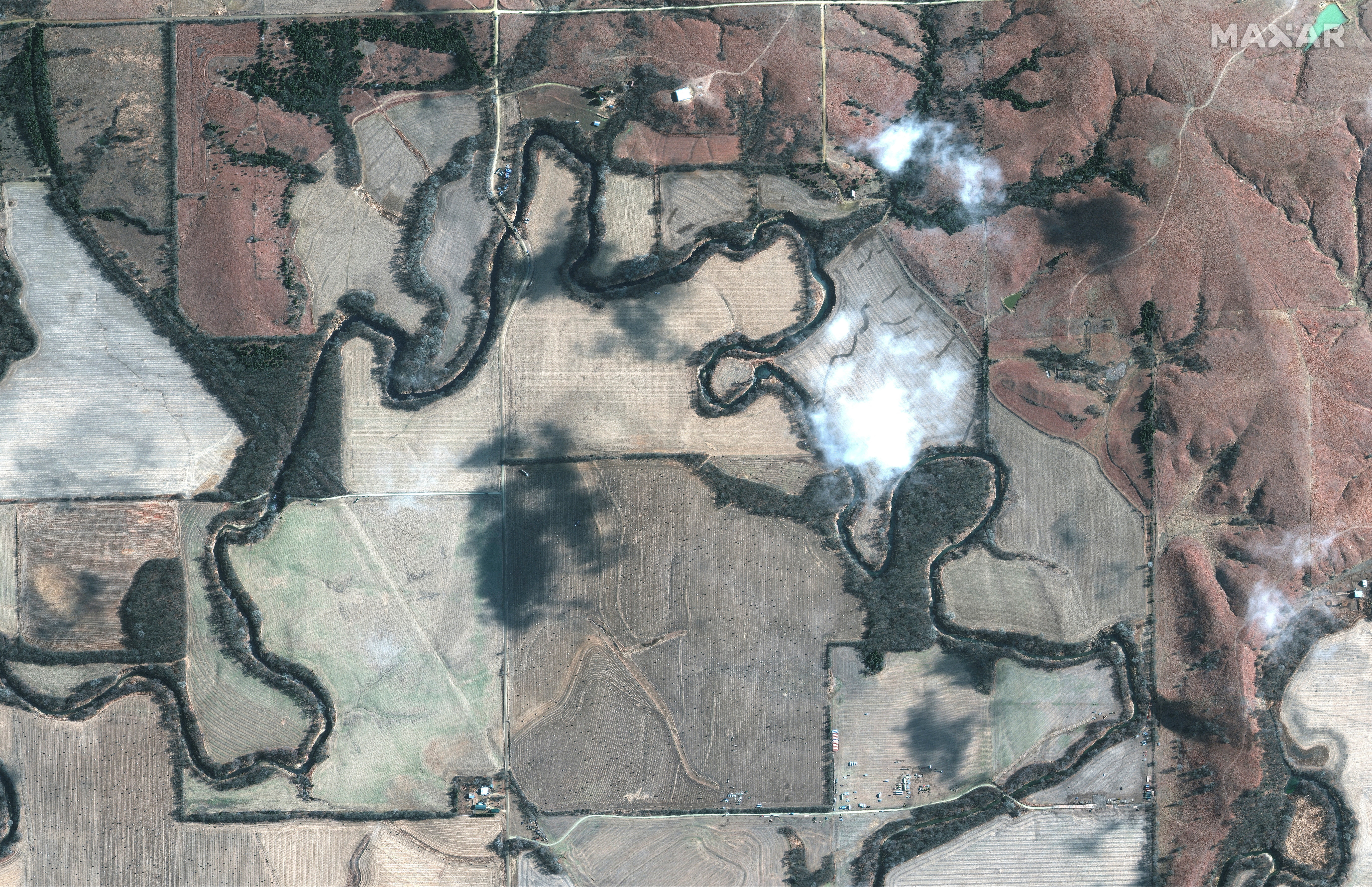 A satellite image shows an overview of the crude oil pipeline spill along Mill Creek, in Kansas