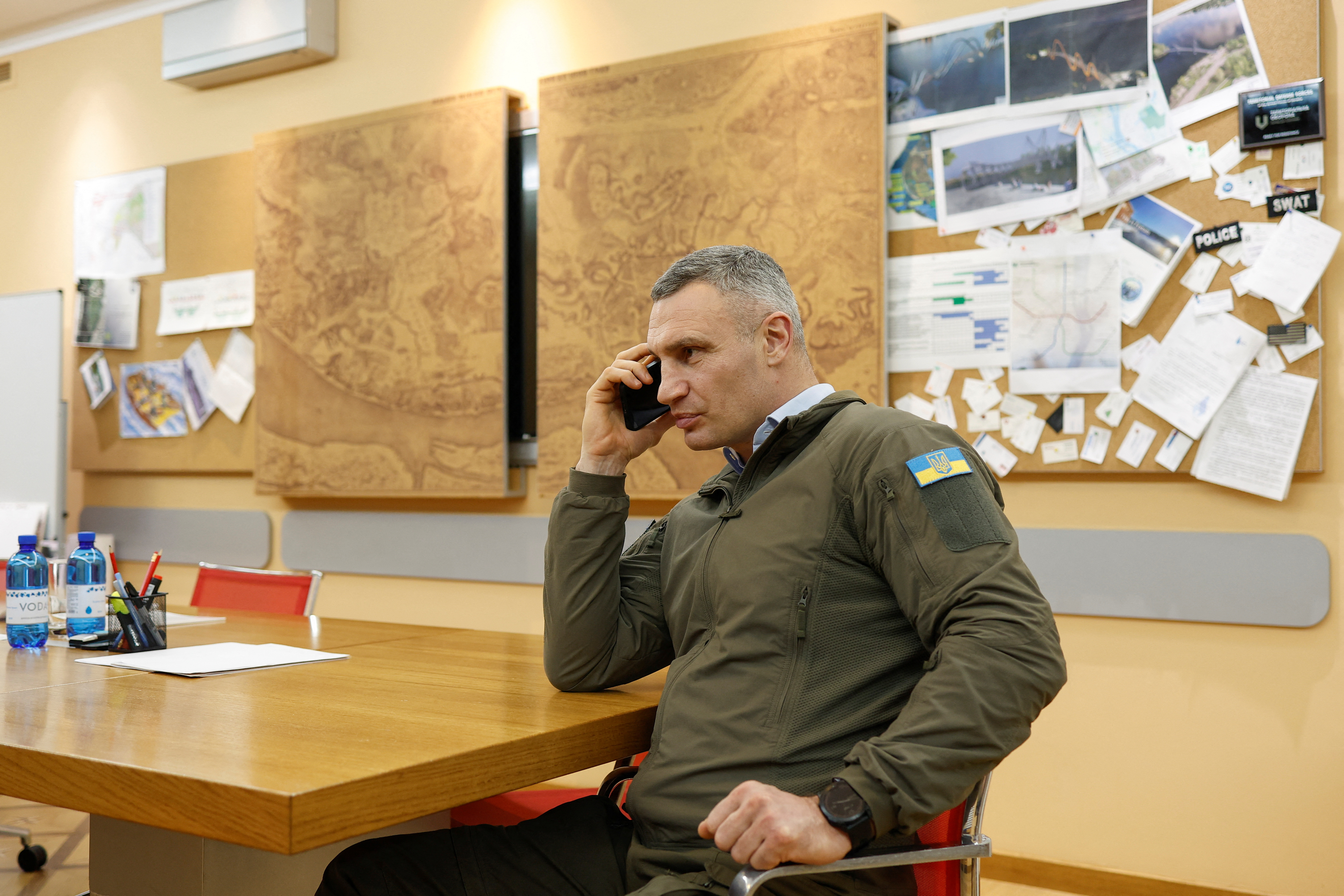 Kyiv Mayor Klitschko speaks on his phone after an interview with Reuters in Kyiv