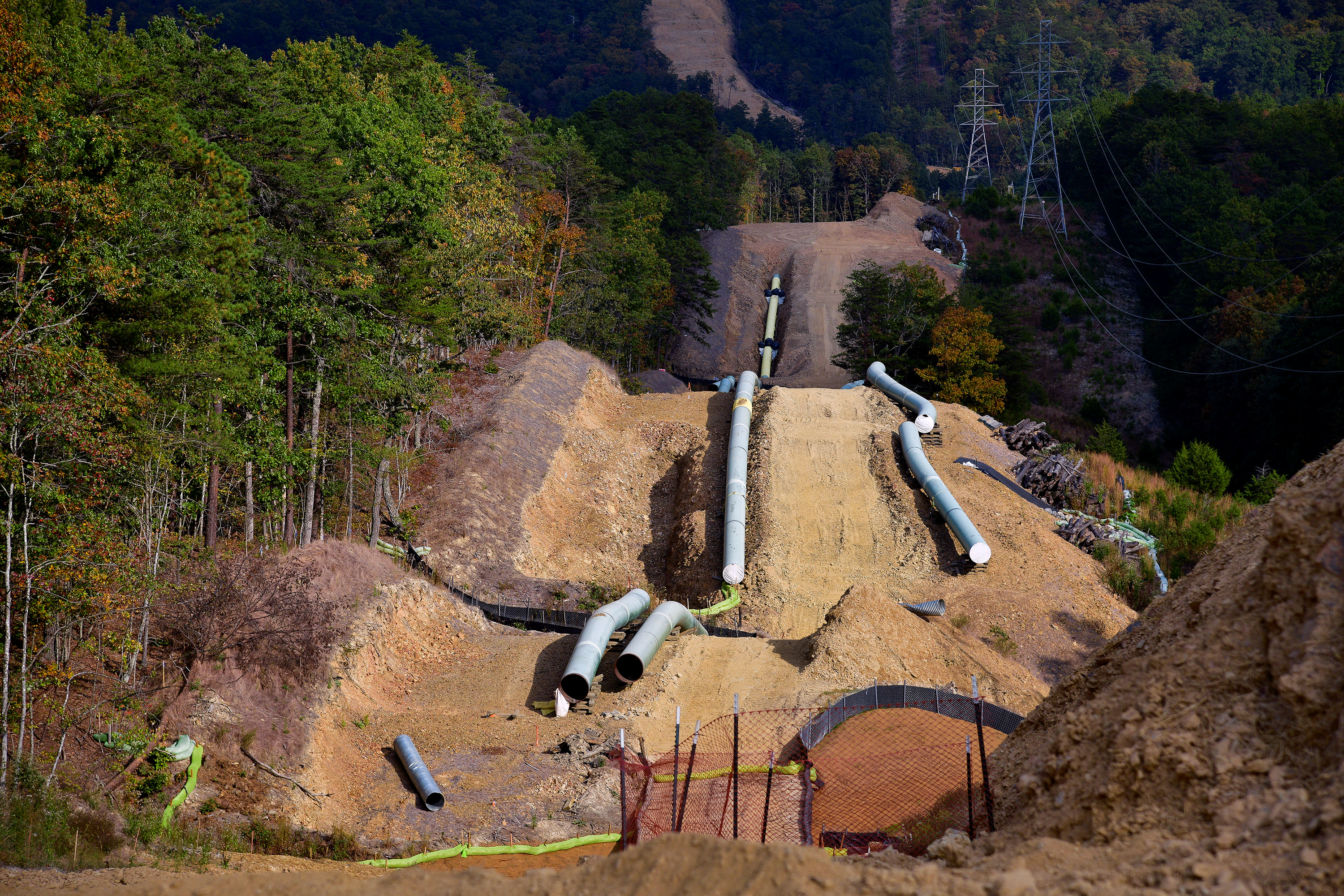 Lengths of pipe wait to be laid in the ground along the under-construction Mountain Valley Pipeline near Elliston, Virginia, U.S. September 29, 2019. Picture taken September 29, 2019. REUTERS/Charles Mostoller