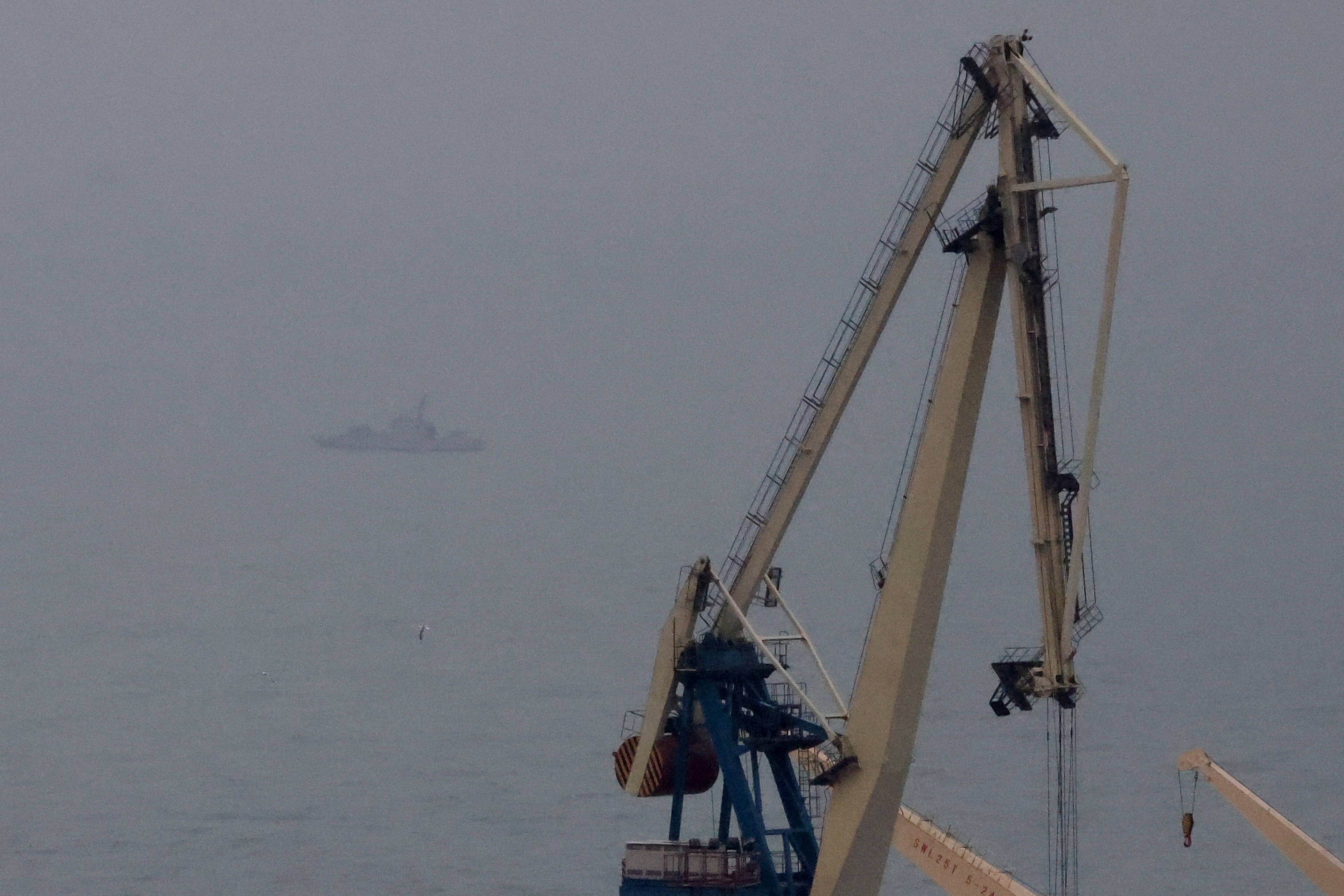 Ukrainian naval vessel is seen patrolling the port of Mariupol after Russian President Vladimir Putin authorized a military operation in eastern Ukraine