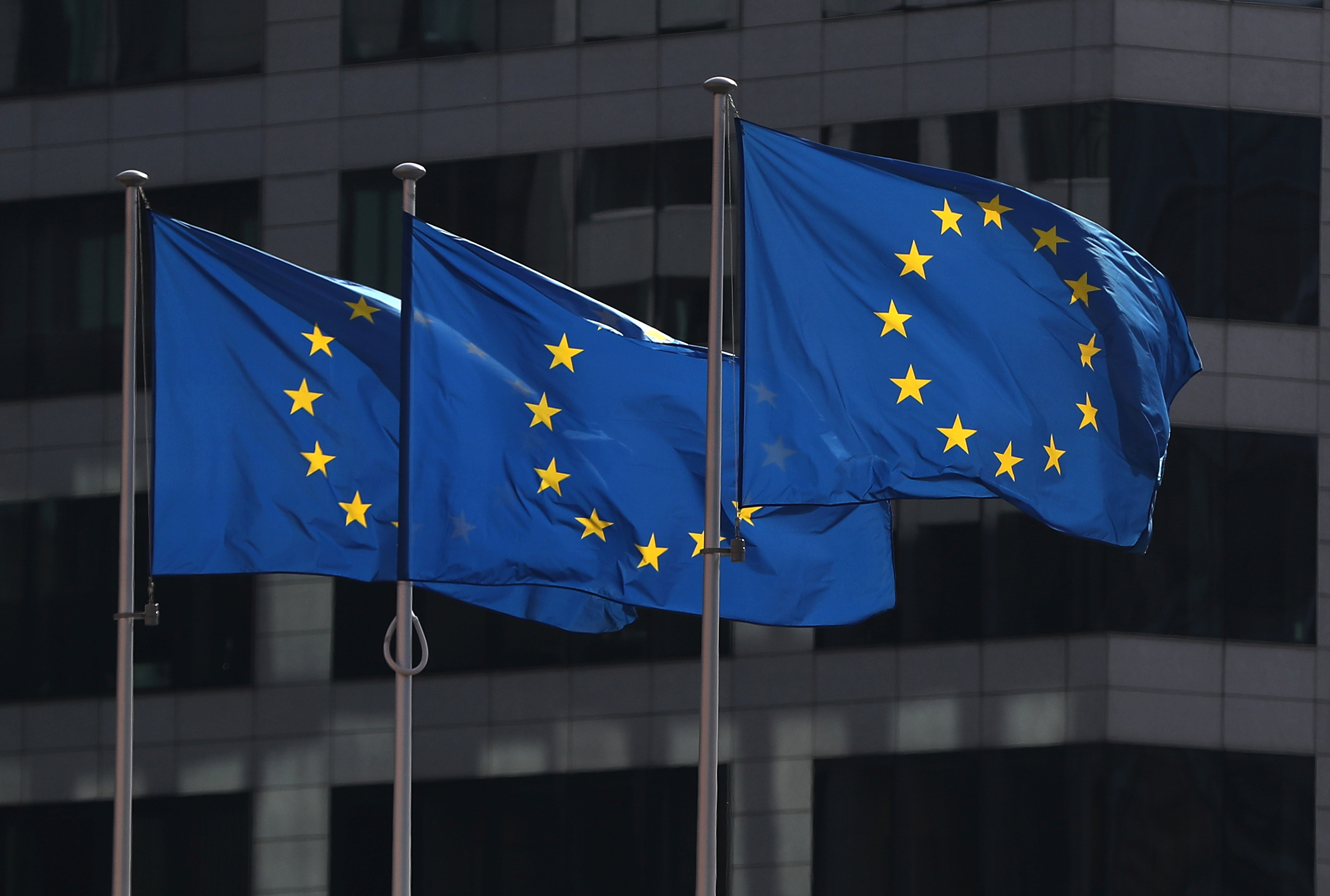 European Union flags fly outside the European Commission headquarters in Brussels, Belgium, April 10, 2019. REUTERS/Yves Herman