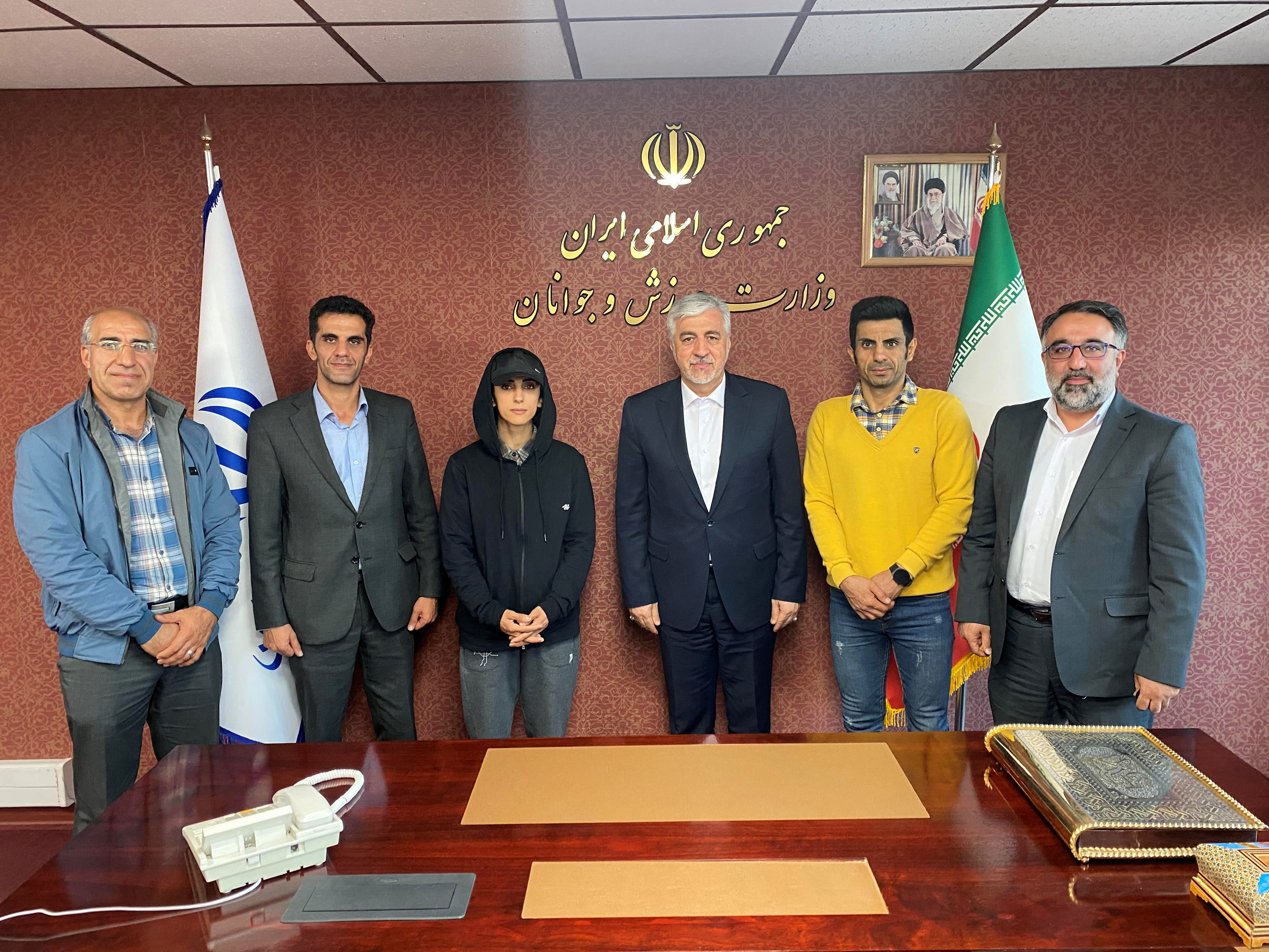 Iran's Minister of Youth Affairs and Sports Hamid Sajjadi meets with Iranian climber Elnaz Rekabi in Tehran