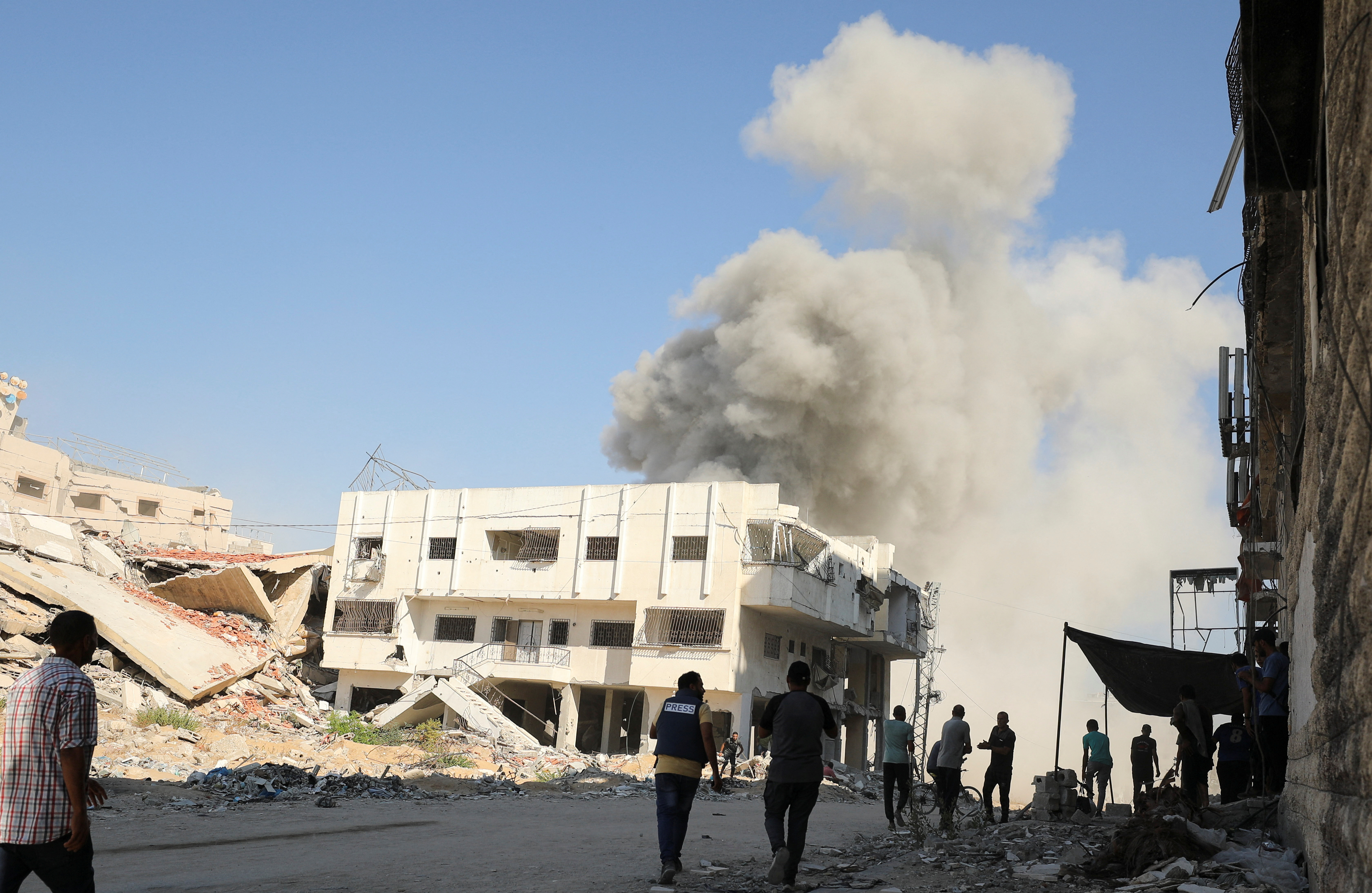 Smoke rises following an Israeli strike, in Gaza City