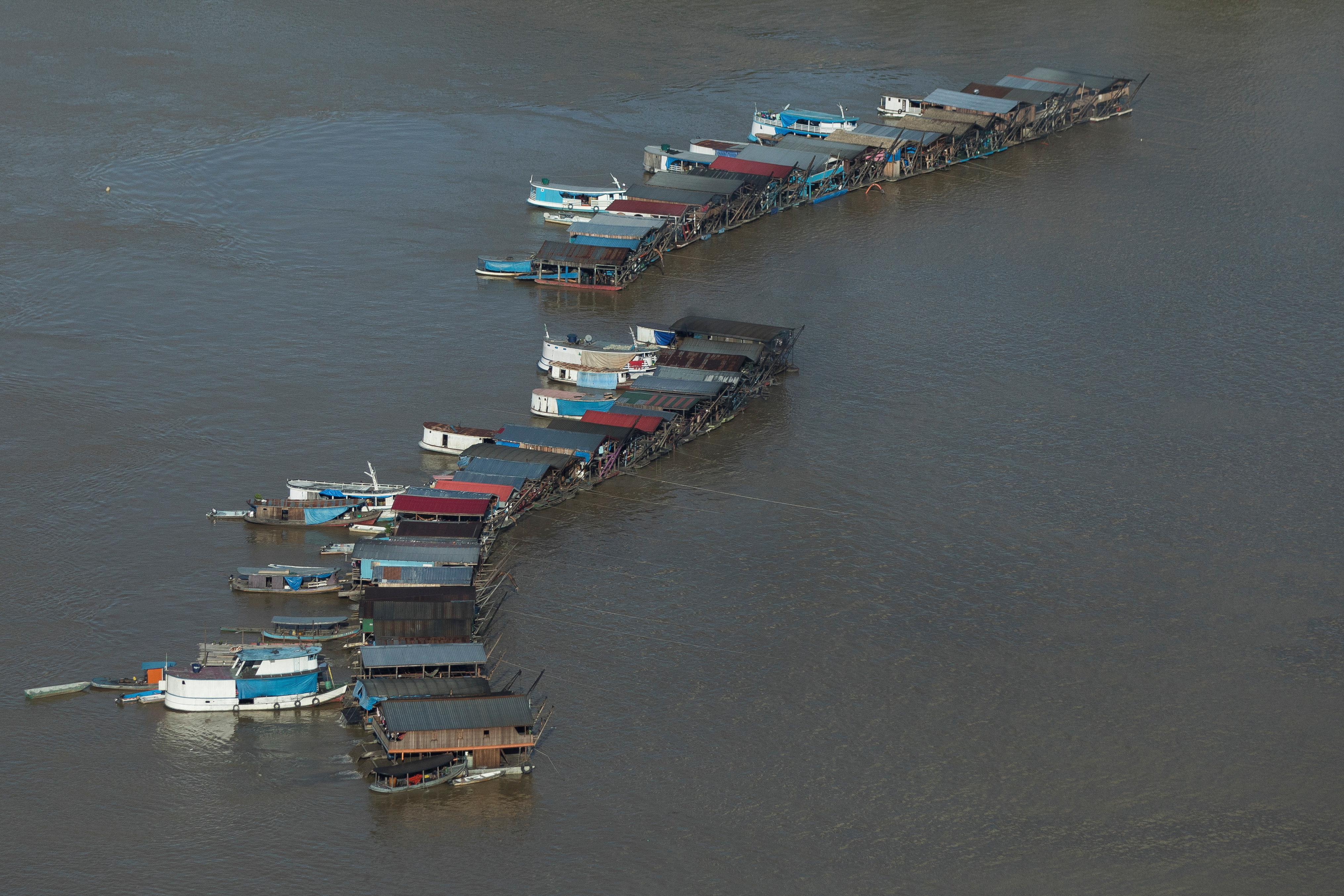 Gold rush draws hundreds of dredging rafts on the Madeira river in Autazes