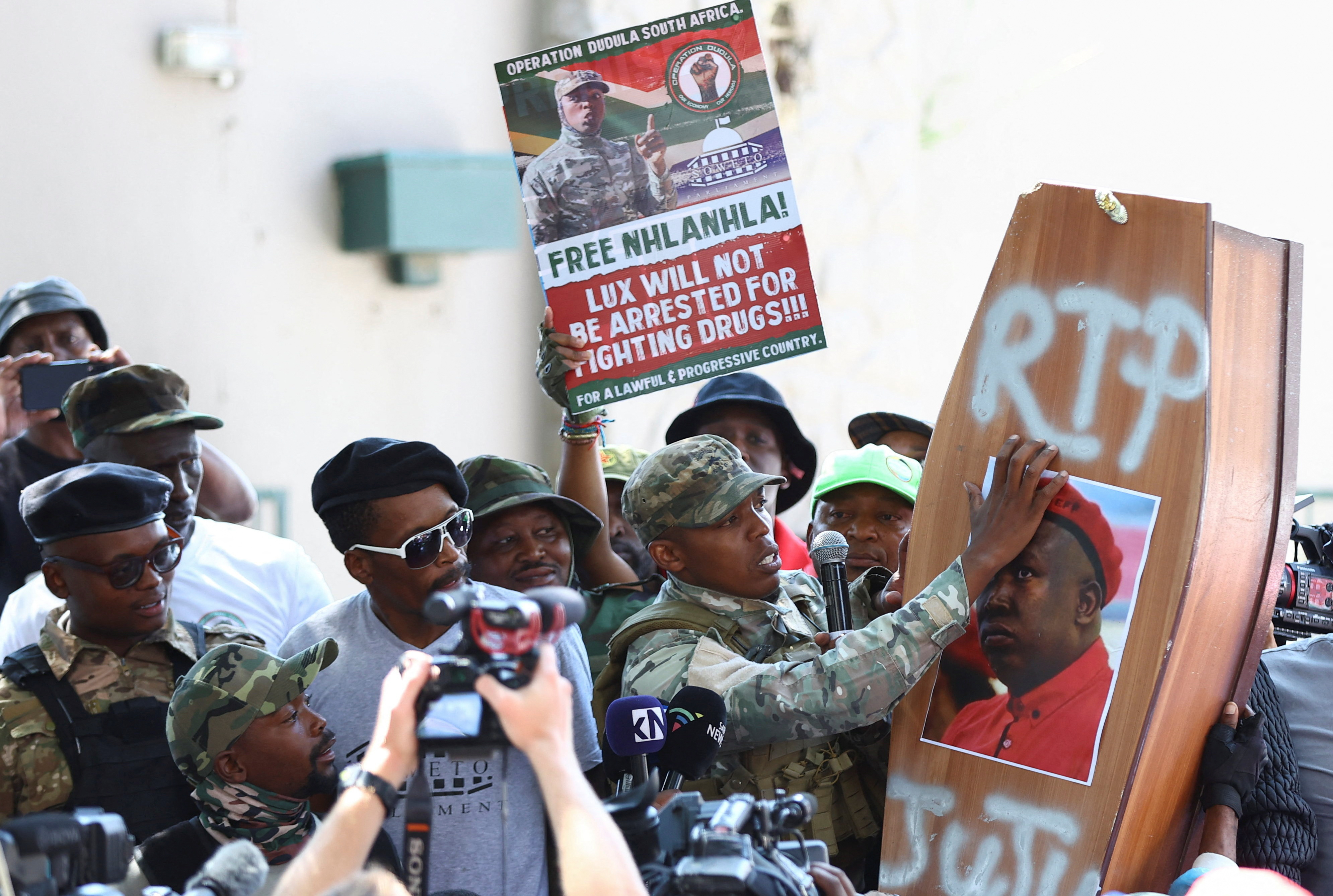Anti-migrant vigilante group Dudula stokes tensions in South Africa