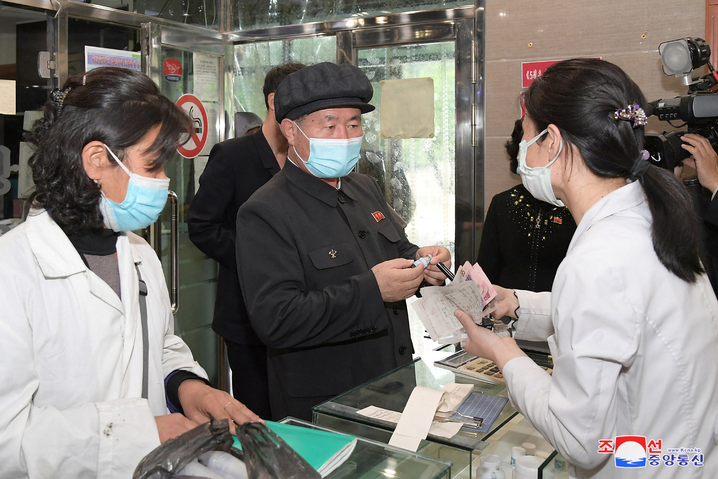 Pak Jong Chon, member of the Presidium of the Political Bureau and secretary of the Central Committee of the Workers' Party of Korea, inspects a pharmacy amid the coronavirus disease (COVID-19) pandemic, in Pyongyang